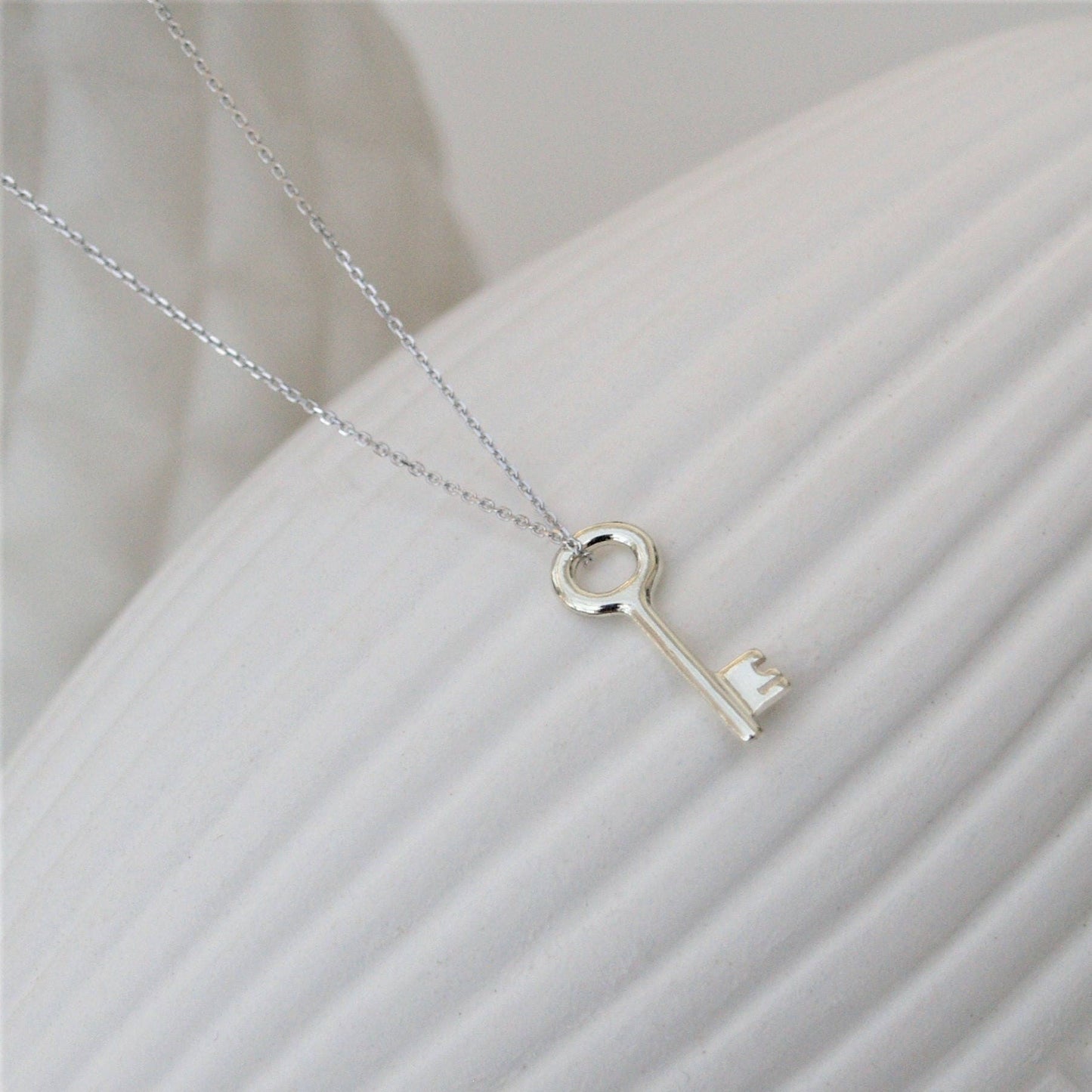 9ct solid white gold small and dainty key charm pendant and chain