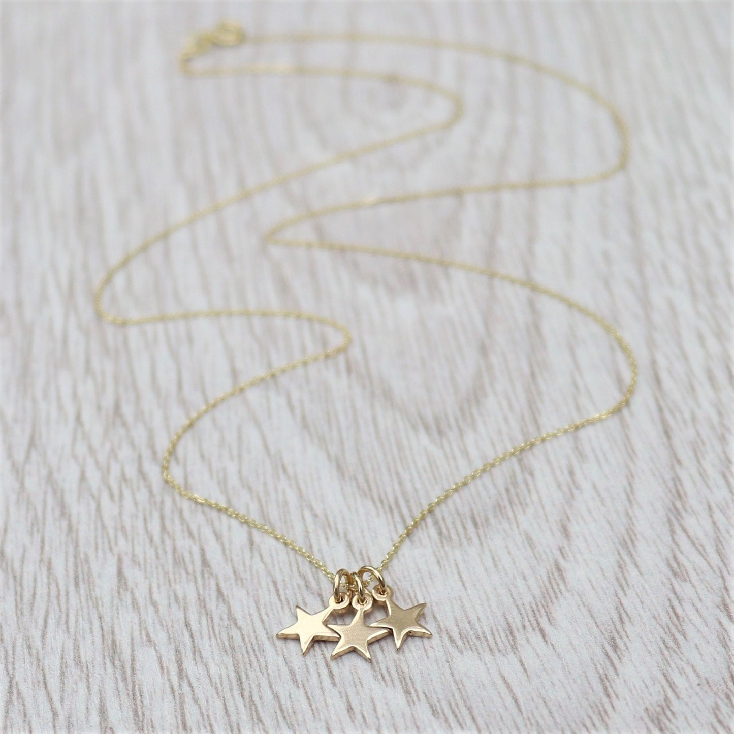 9ct solid yellow gold teeny-weeny star charm pendants and chain