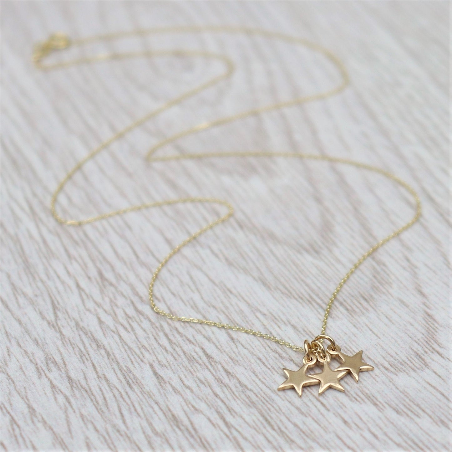 9ct solid yellow gold teeny-weeny star charm pendants and chain