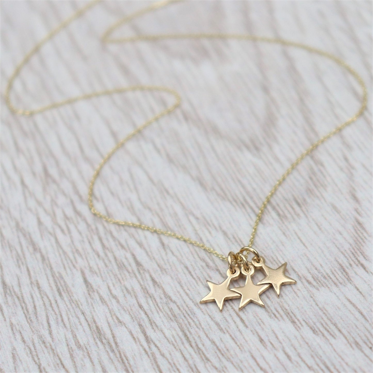 9ct solid yellow gold teeny-weeny star charm pendants and chain