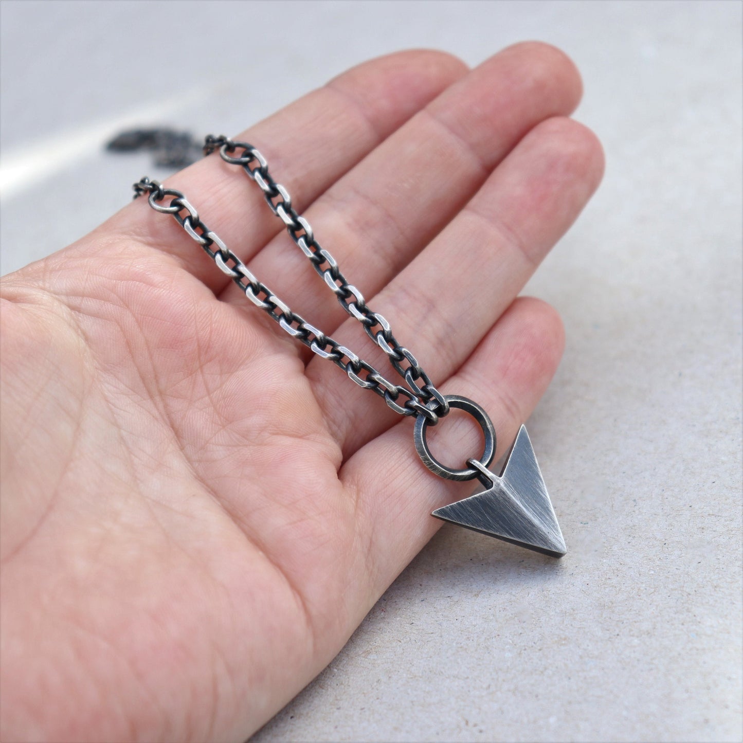 Oxidised solid silver large arrow pendant on two widths of diamond cut trace chain