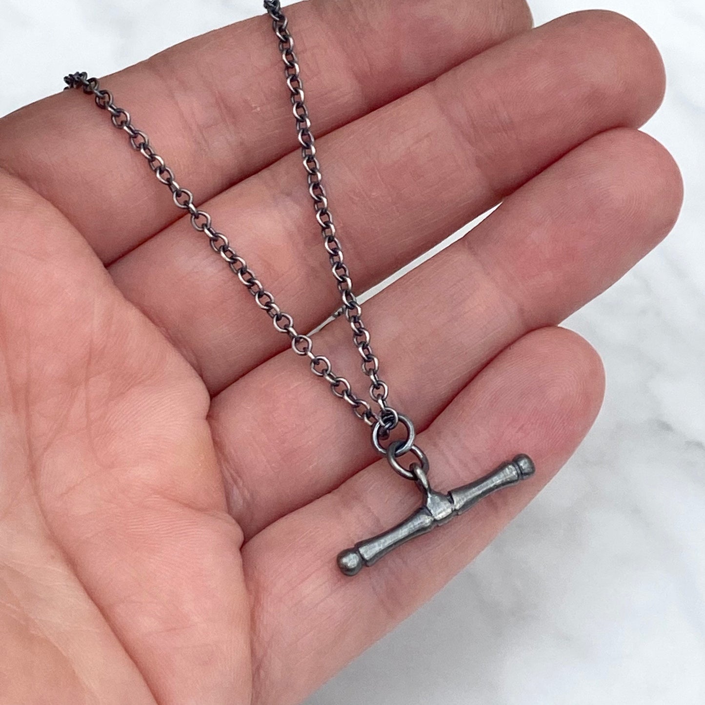 Oxidised or polished solid silver T-bar pendant on a trace chain