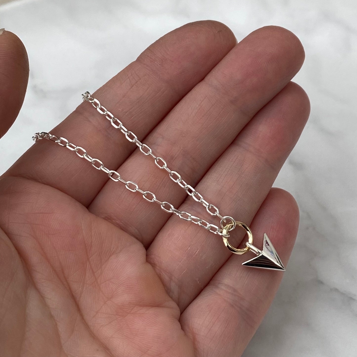 Oxidised or polished solid silver arrow pendant and 9ct yellow gold loop detail on a diamond cut trace chain - Men’s jewellery