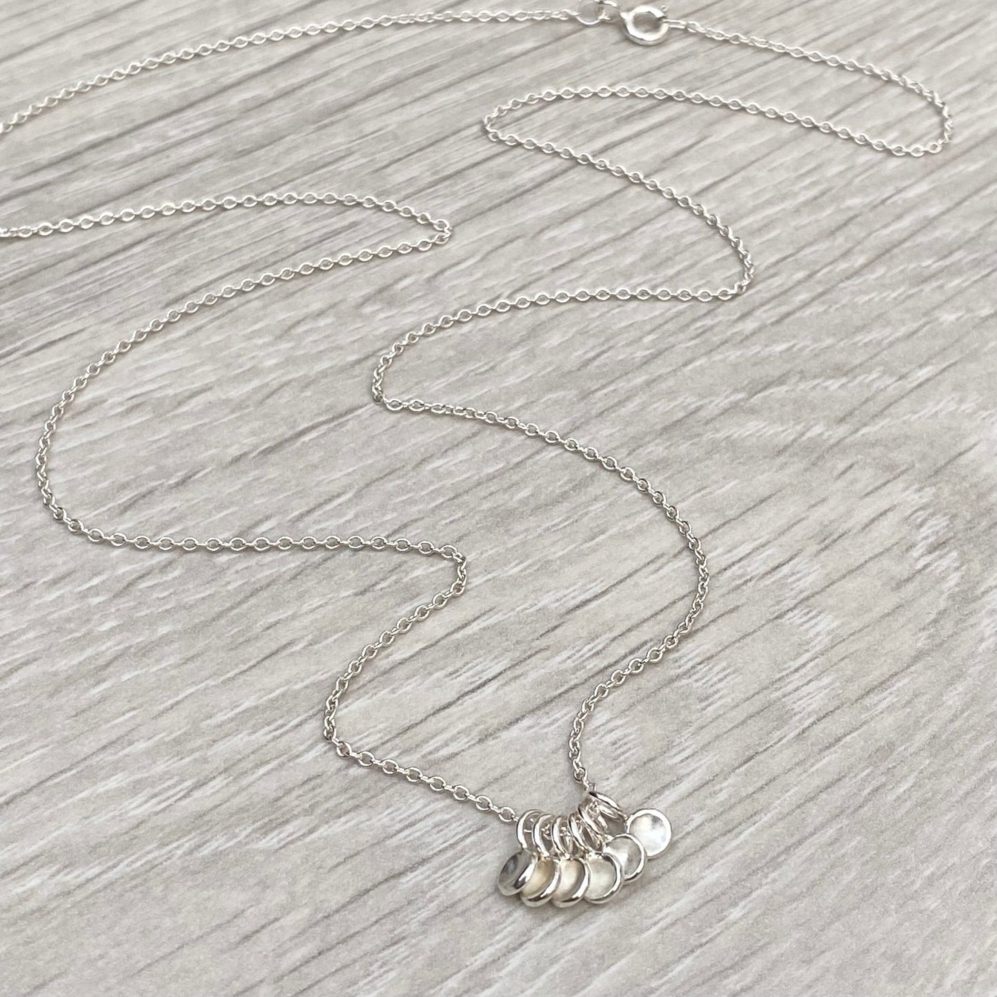 Handmade solid silver six tiny petal charm pendants on trace chain
