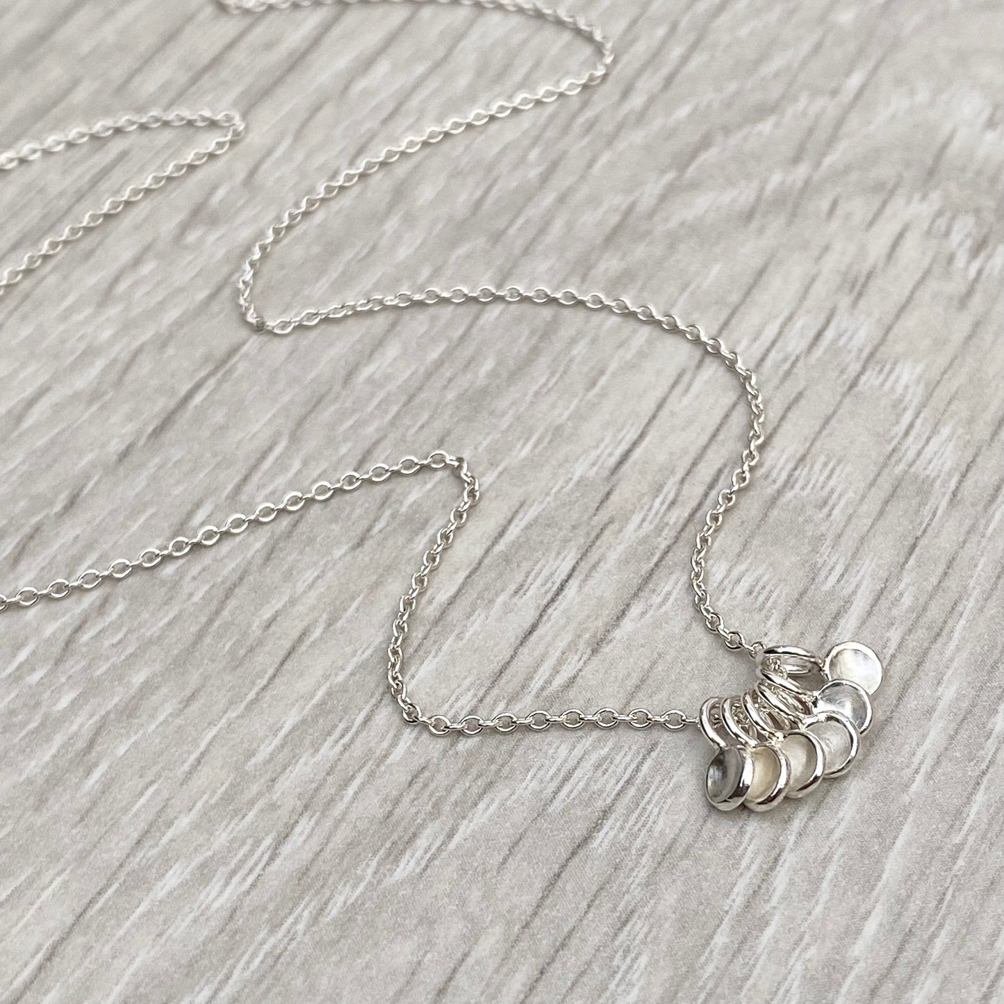 Handmade solid silver six tiny petal charm pendants on trace chain