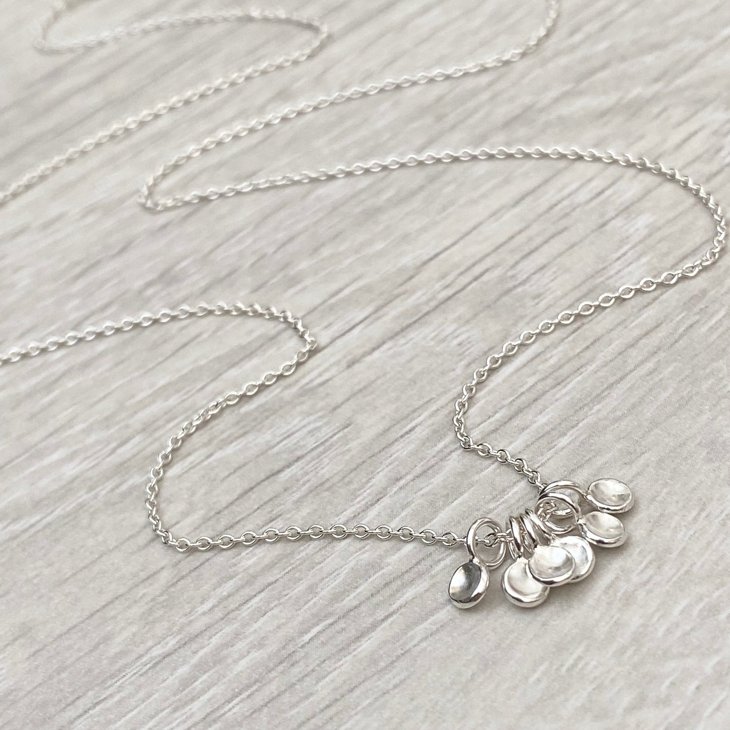 Handmade solid silver six tiny petal charm pendants on trace chain