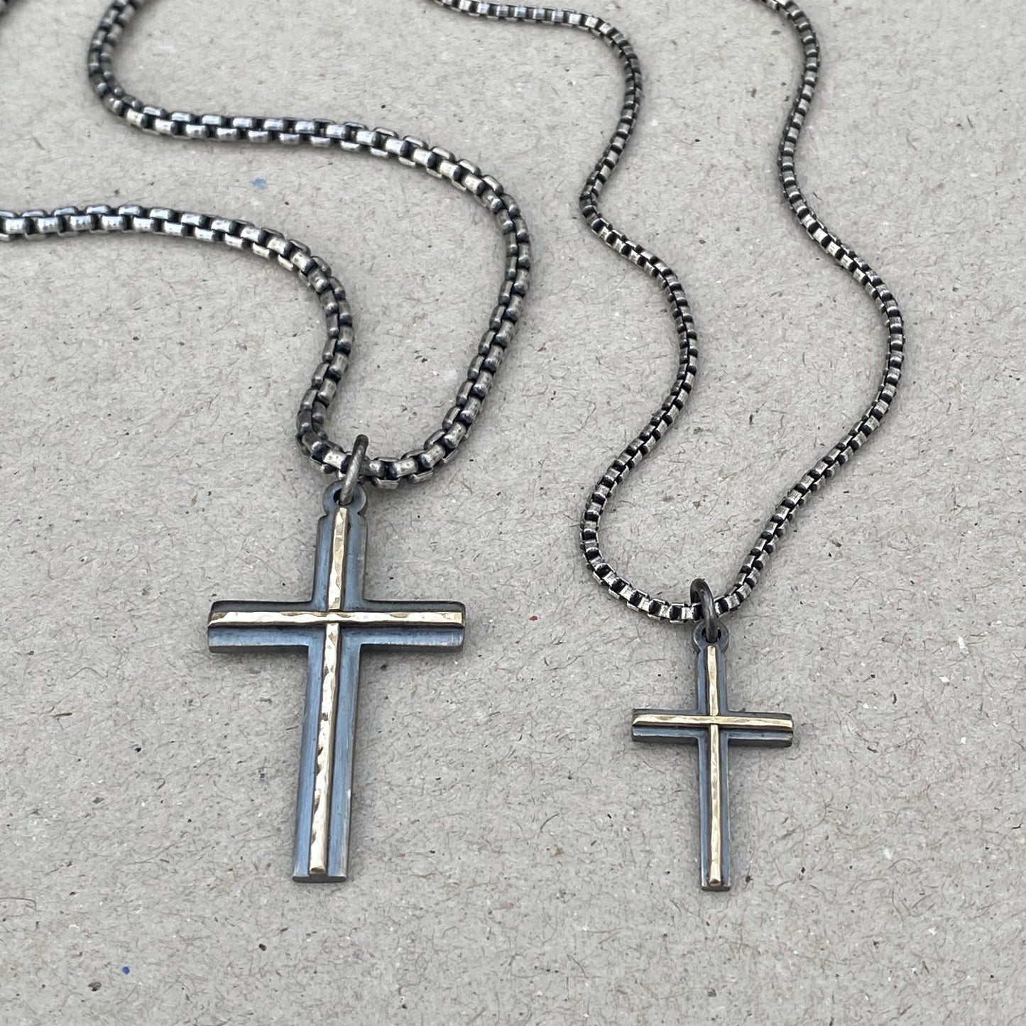 Oxidised solid silver small or large size cross pendant with a polished hammered 9ct yellow gold line detail on a round box chain