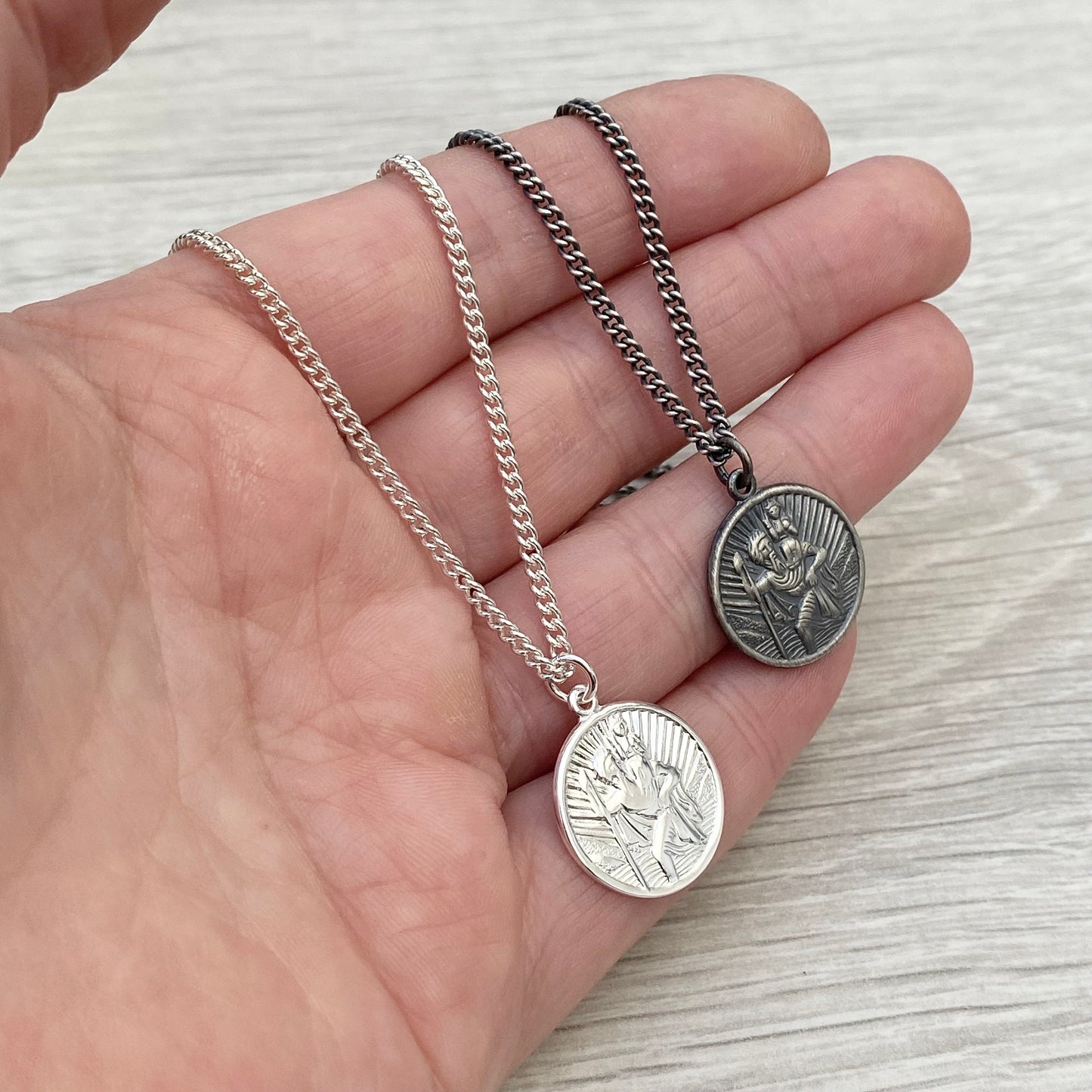 Oxidised or polished solid silver round Saint Christopher pendant on a curb chain