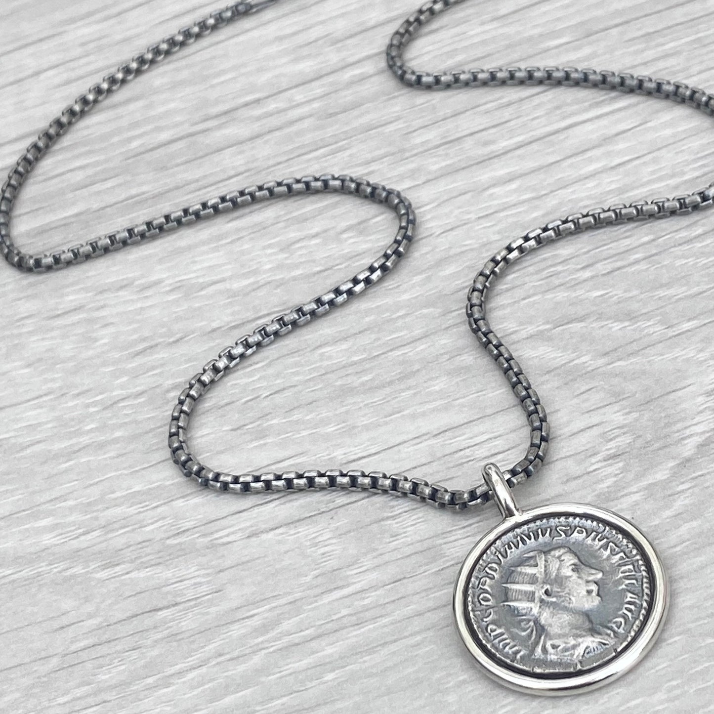 Oxidised solid Sterling silver 23mm replica Roman coin circle framed pendant on a choice of trace or round box chain