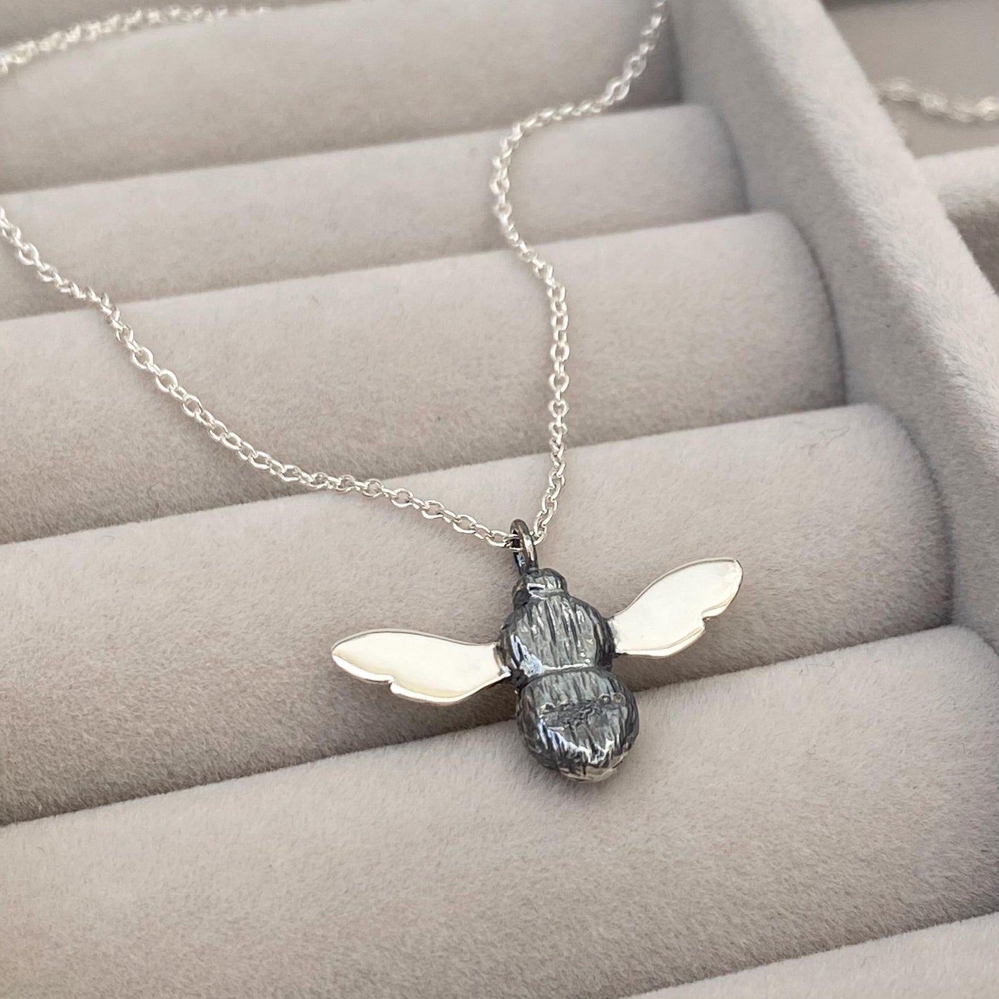 Oxidised solid silver and gold detail Bumblebee pendant on a silver trace chain