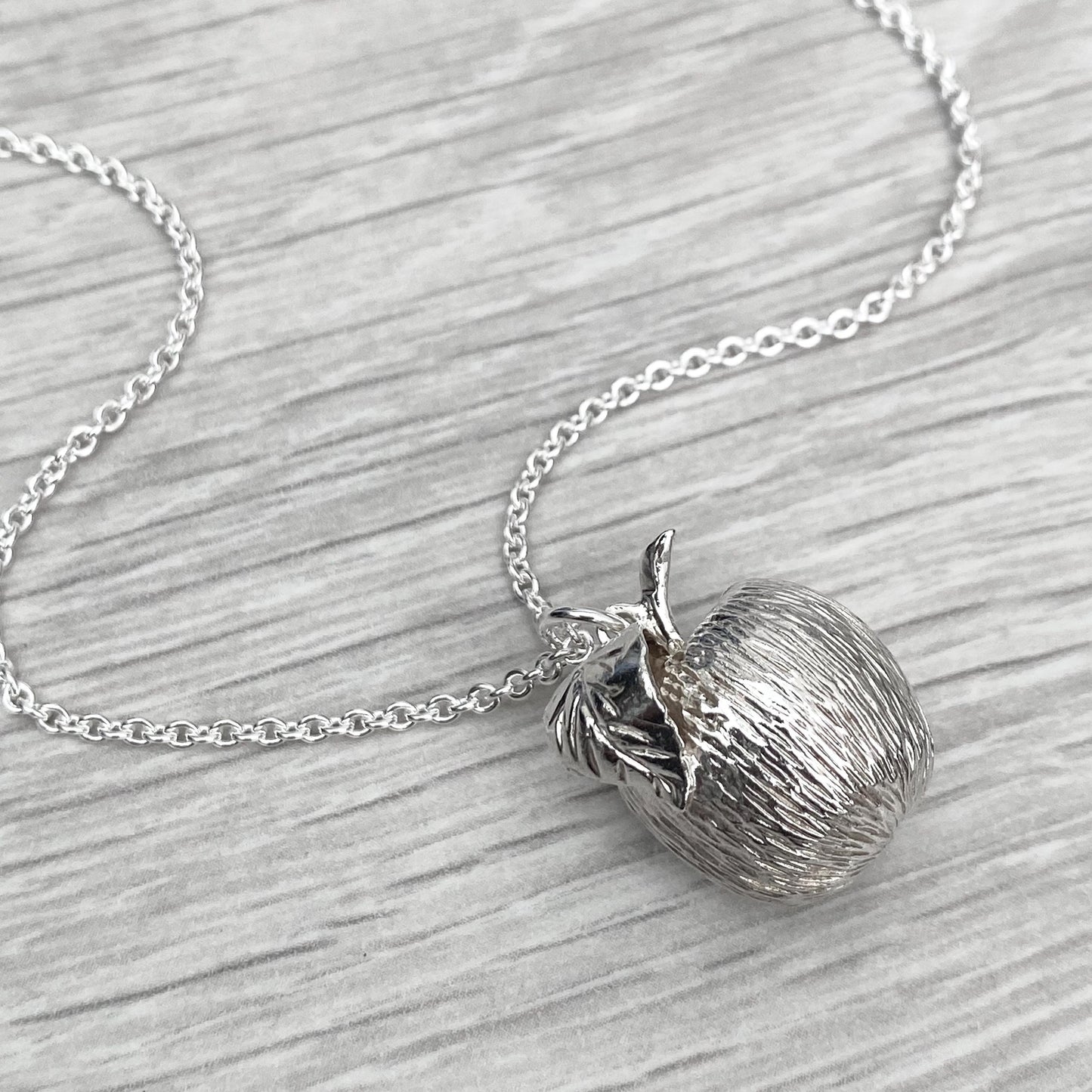 Vintage 1970s large solid silver apple pendant on a new 28” silver trace chain
