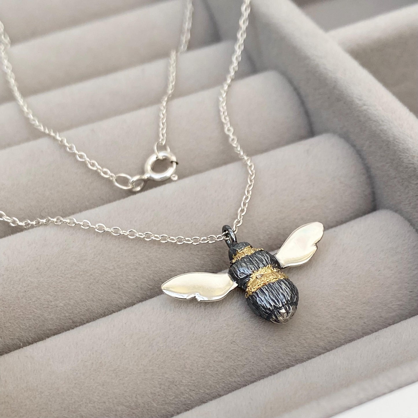 Oxidised solid silver and gold detail Bumblebee pendant on a silver trace chain