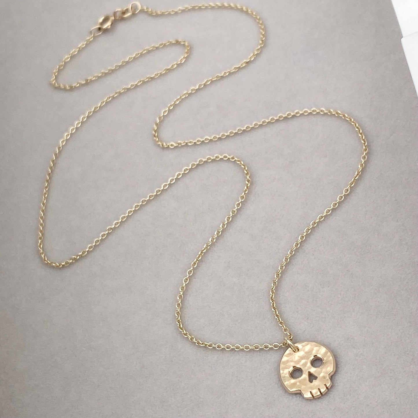 Handmade 9ct solid yellow, rose or white gold skull charm pendant on a trace chain
