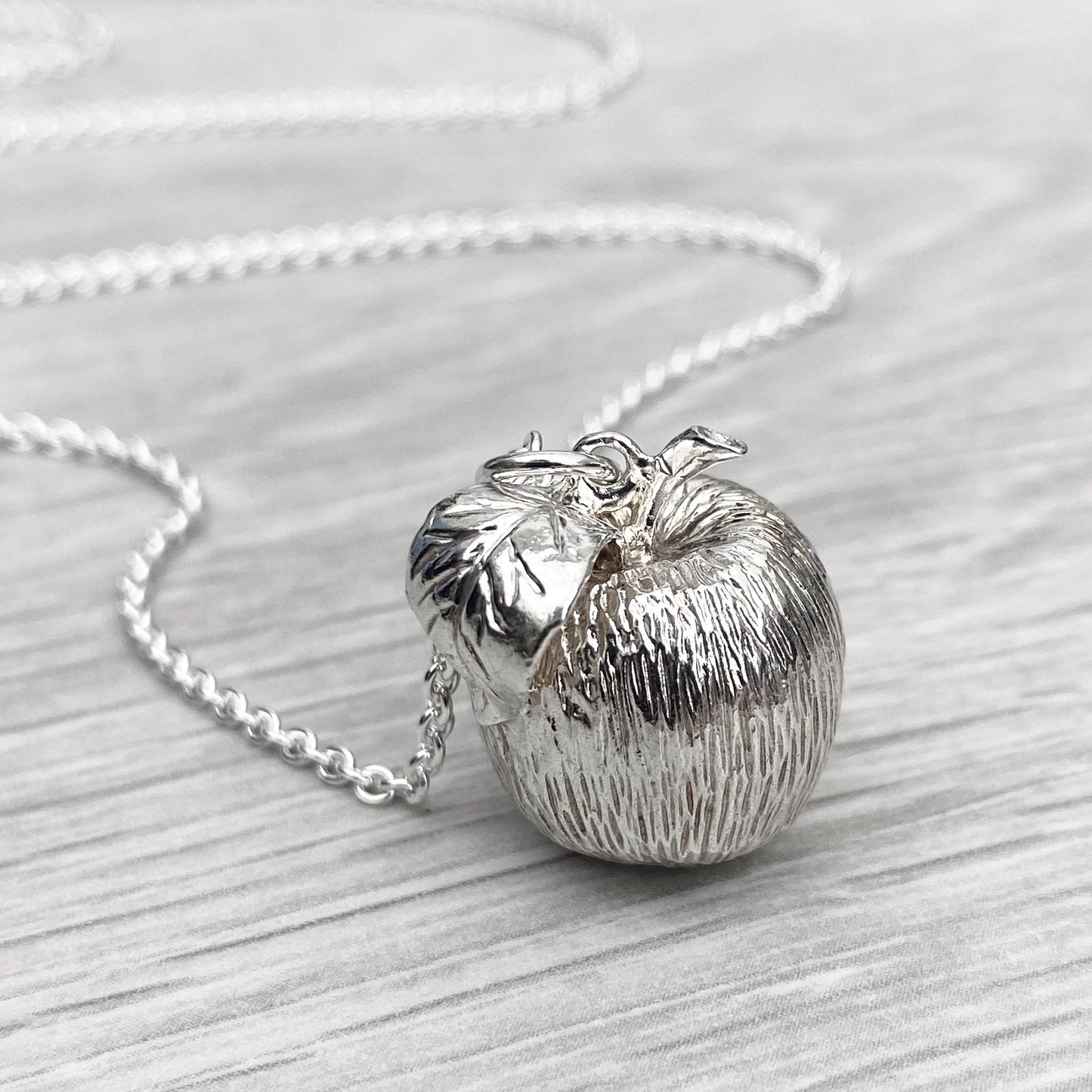 Vintage 1970s large solid silver apple pendant on a new 28” silver trace chain