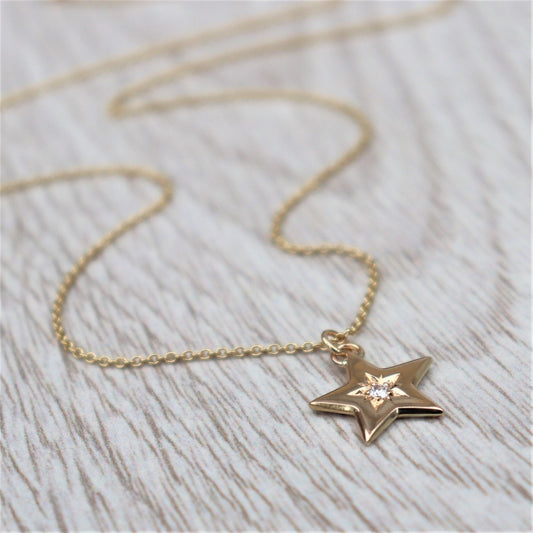 9ct solid yellow gold engraved diamond star pendant on a 1.2mm wide trace chain