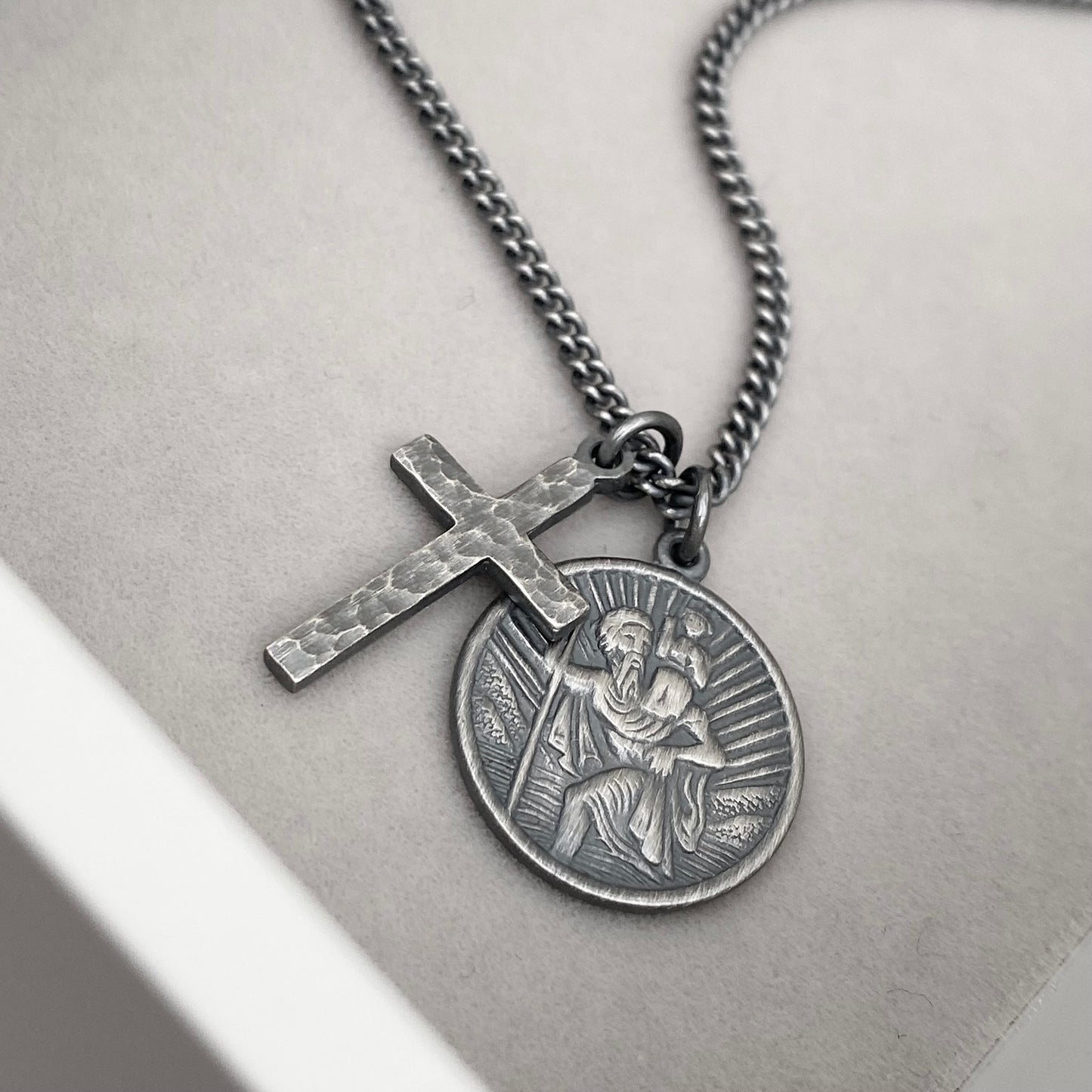 Oxidised or polished silver round Saint Christopher and hammered cross pendant and curb chain