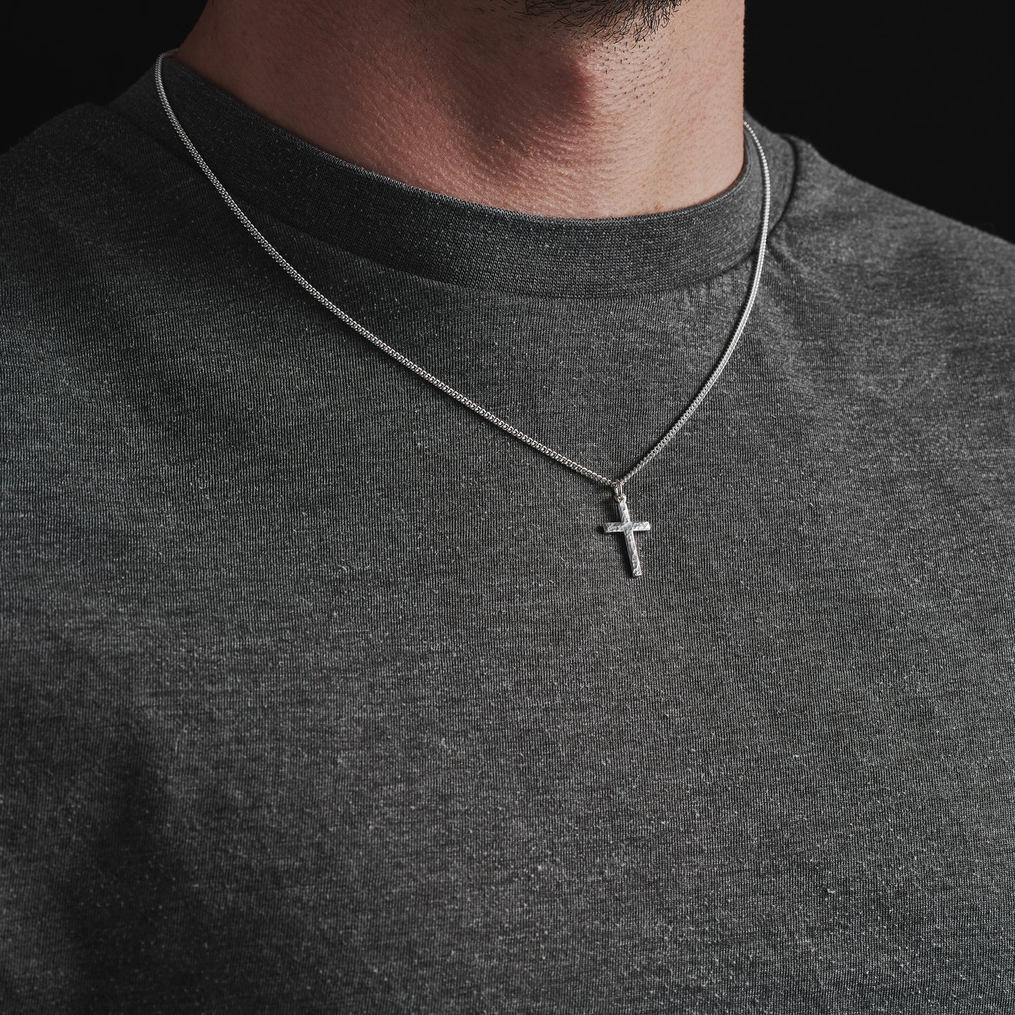 Polished sterling silver hammered finish small, standard, and medium cross pendants on a curb chain
