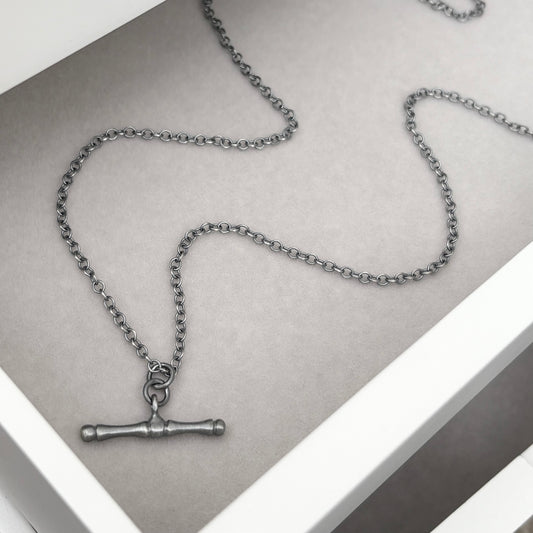 Oxidised or polished solid sterling silver T-bar pendant on a trace chain