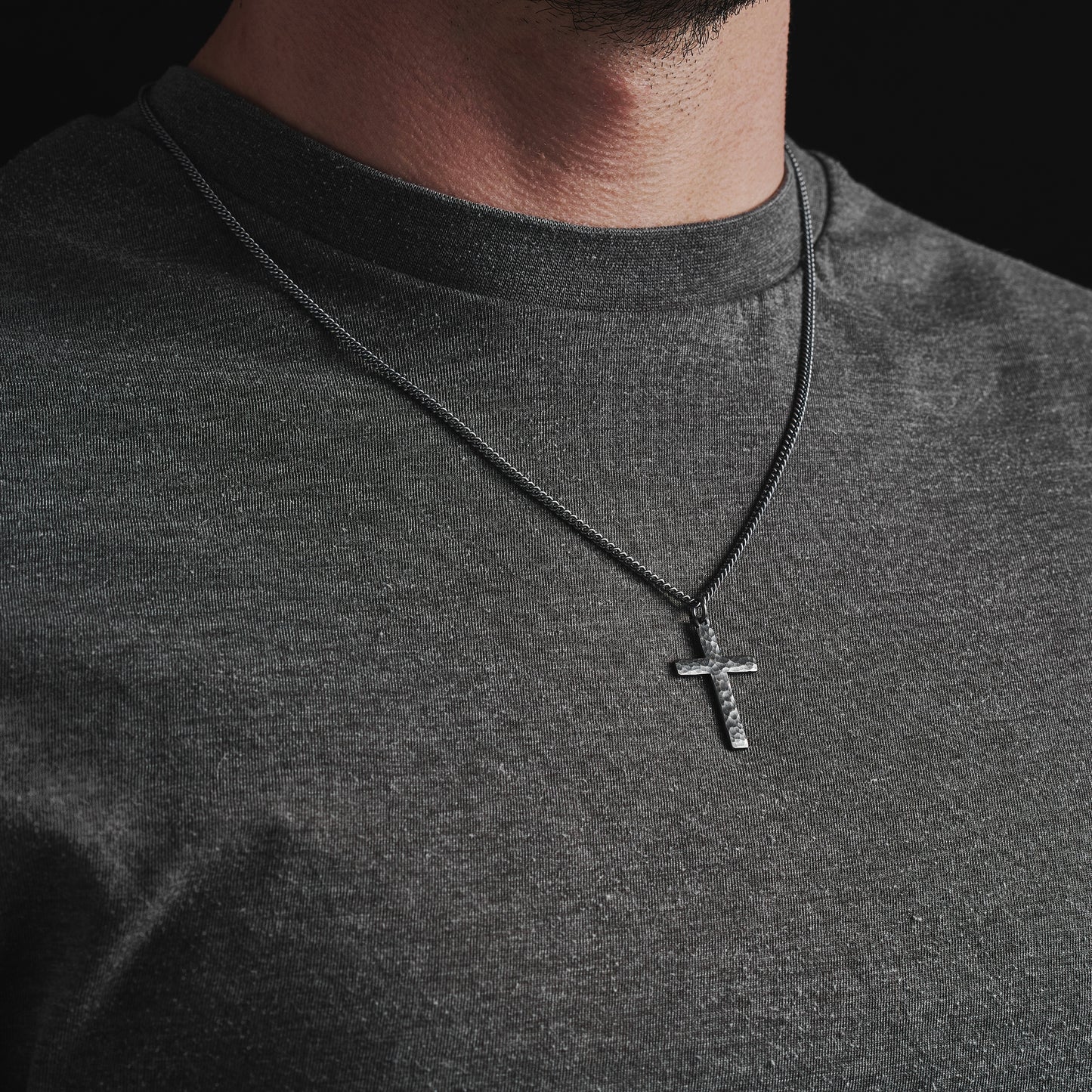 Antiqued sterling silver hammered finish small, standard, and medium cross pendants on a curb chain