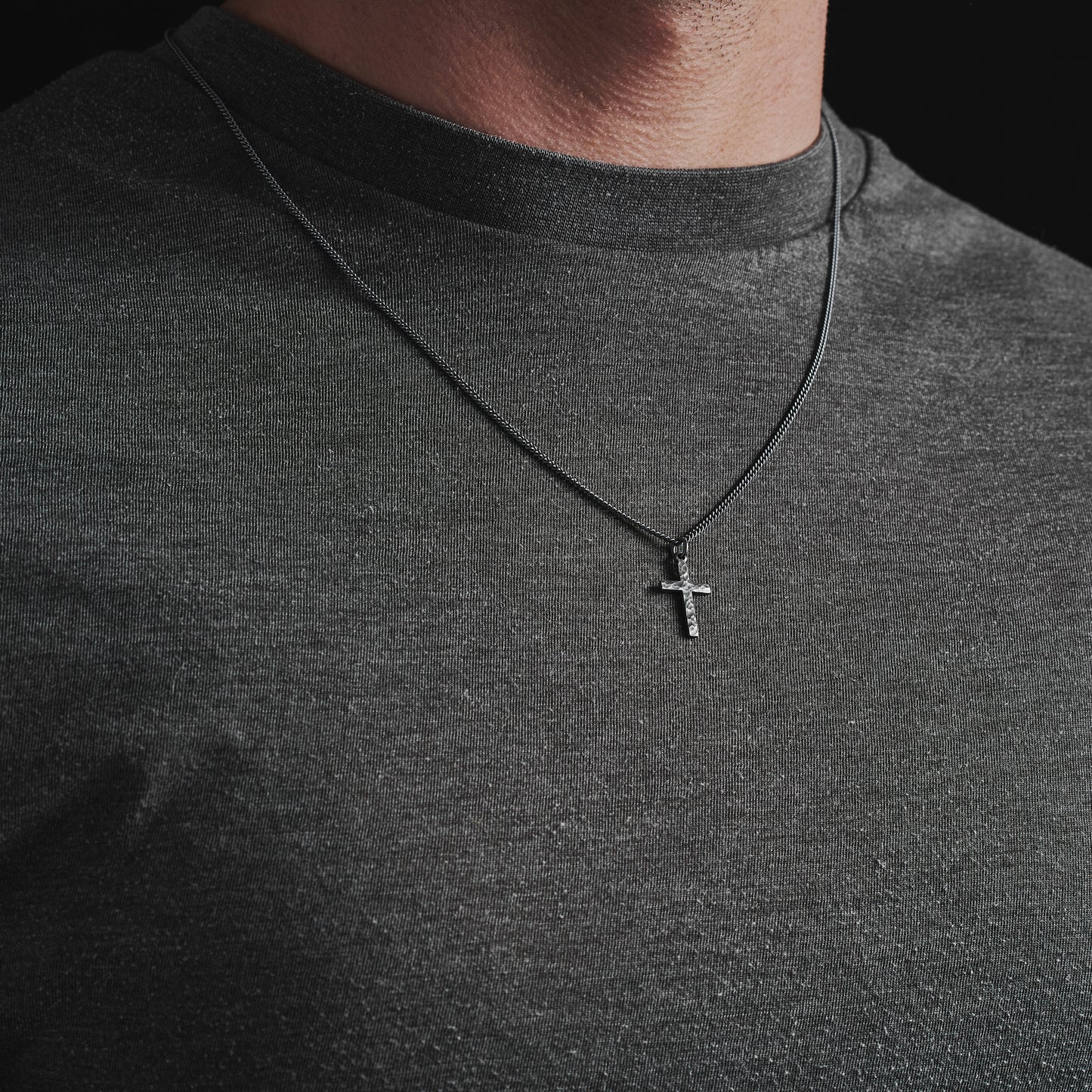 Antiqued sterling silver hammered finish small, standard, and medium cross pendants on a curb chain