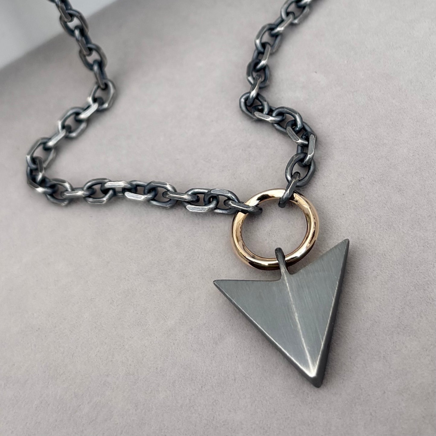 Oxidised or polished sterling silver large arrow and 9ct yellow gold loop pendant on a diamond cut trace chain