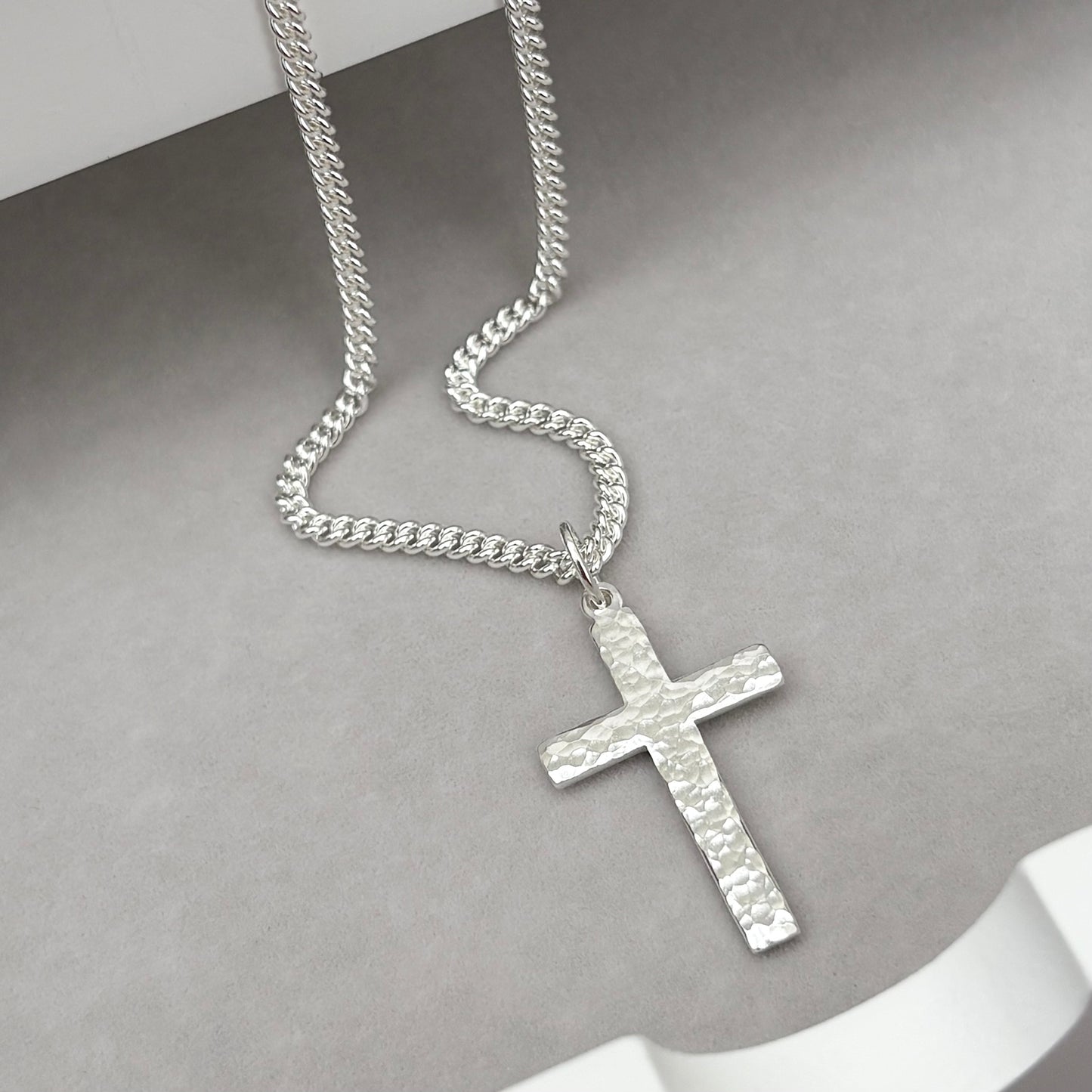 Oxidised or polished medium size sterling silver hammered cross pendant on a curb chain