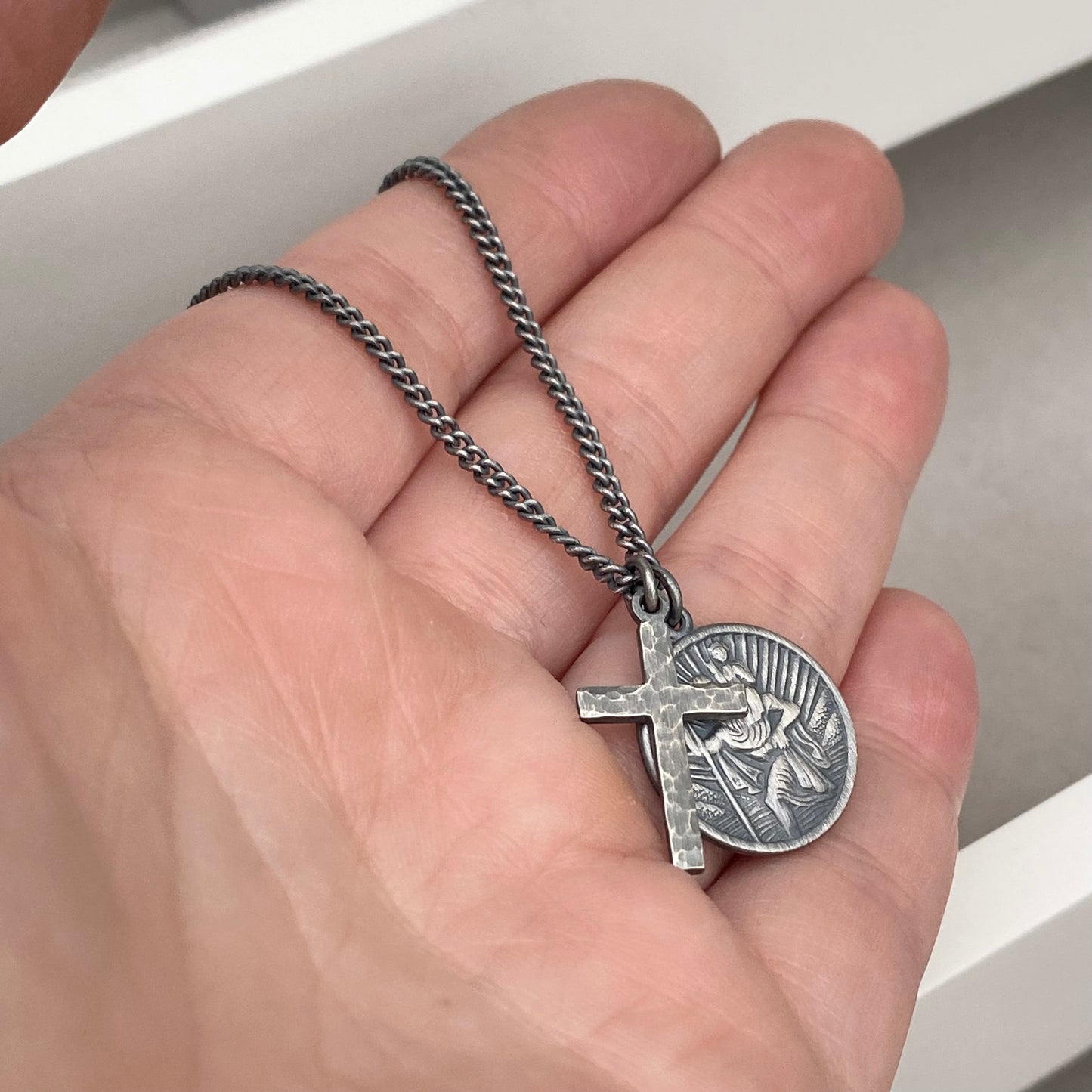 Oxidised or polished silver round Saint Christopher and hammered cross pendant and curb chain