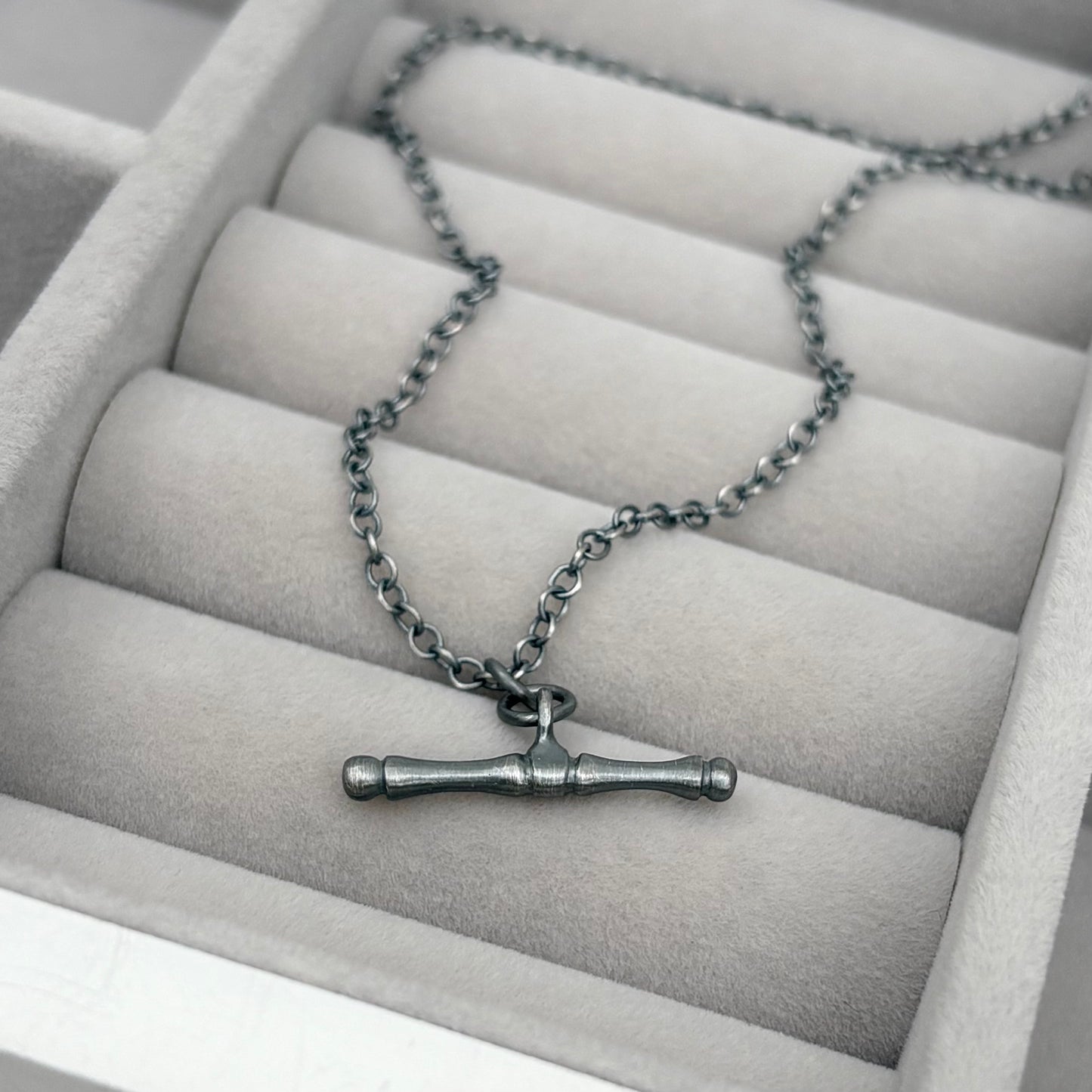 Oxidised or polished solid sterling silver T-bar pendant on a trace chain