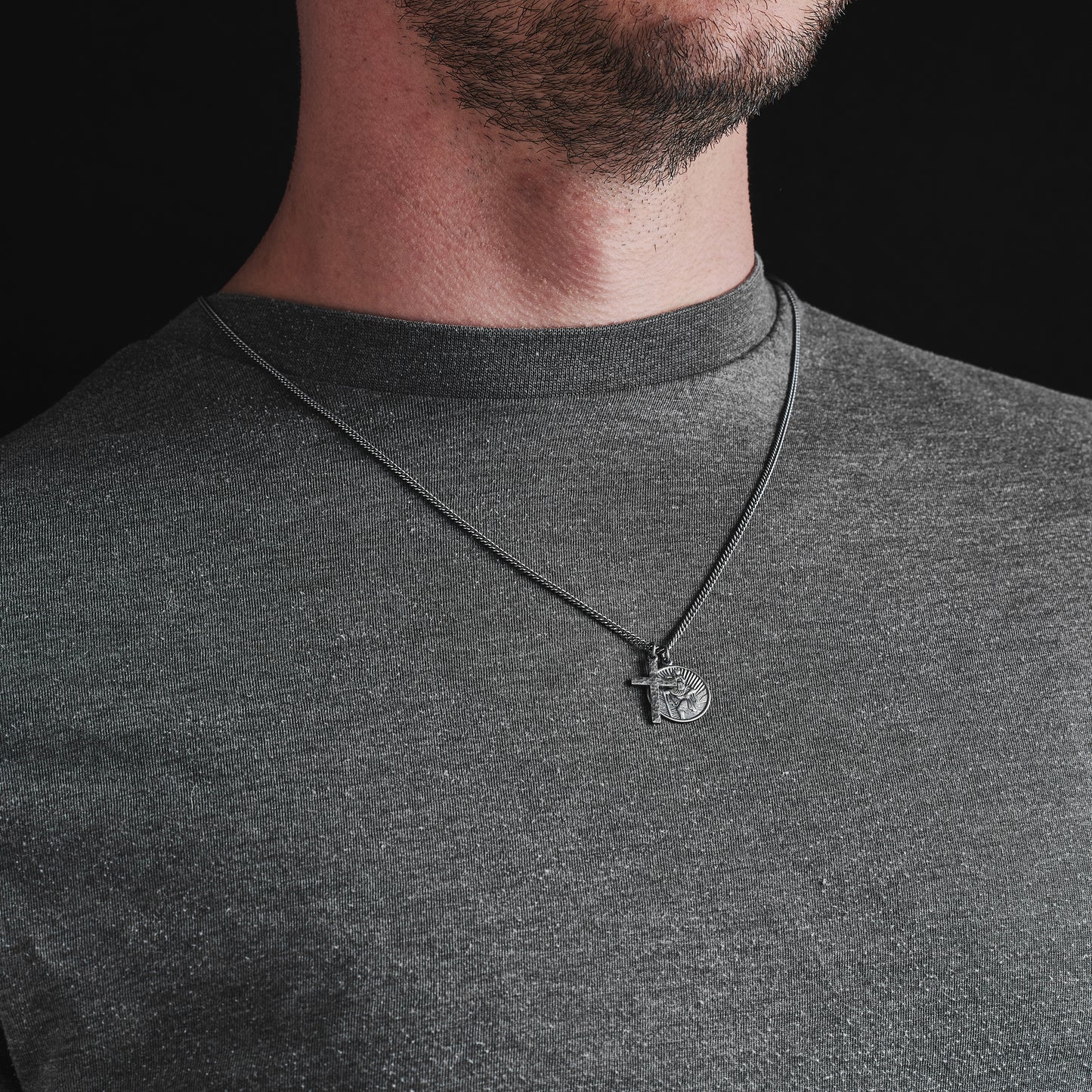 Oxidised or polished silver round Saint Christopher and hammered cross pendant and curb chain