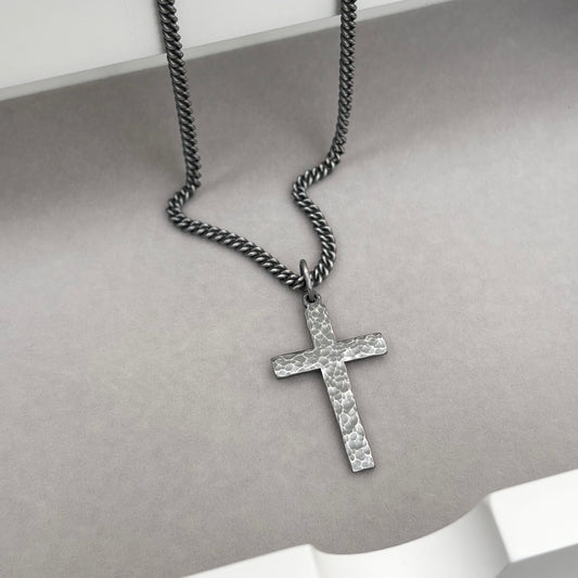 Oxidised or polished medium size sterling silver hammered cross pendant on a curb chain