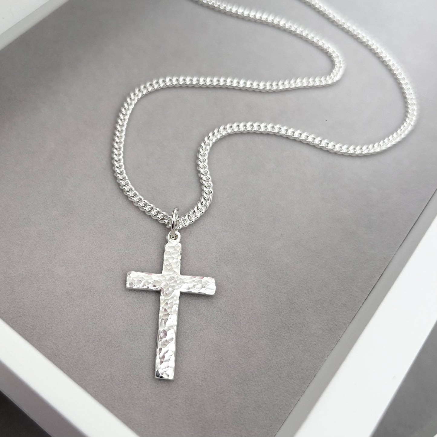 Oxidised or polished medium size sterling silver hammered cross pendant on a curb chain