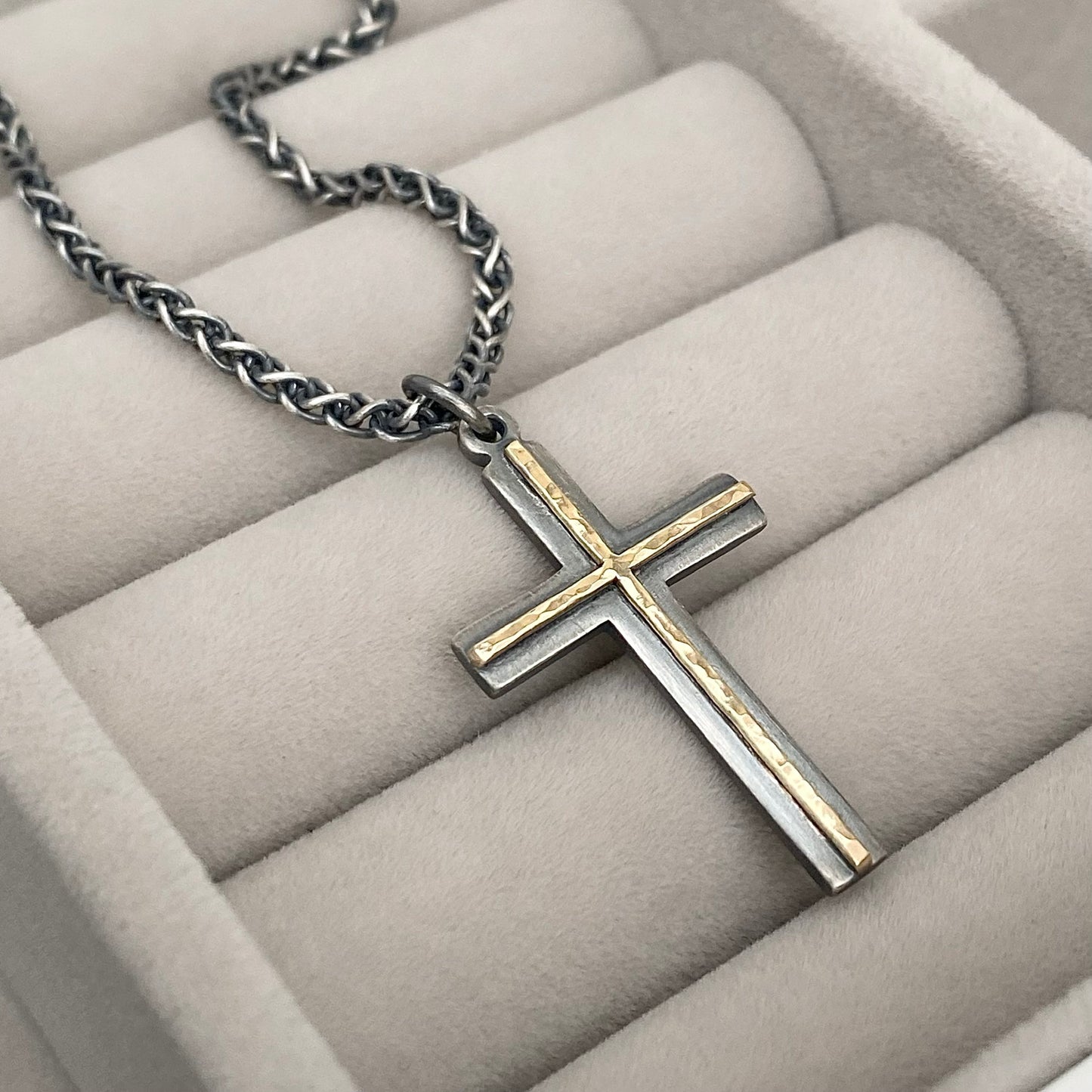 Oxidised solid sterling silver and hammered 9ct yellow gold medium cross pendant on an oxidised silver spiga chain