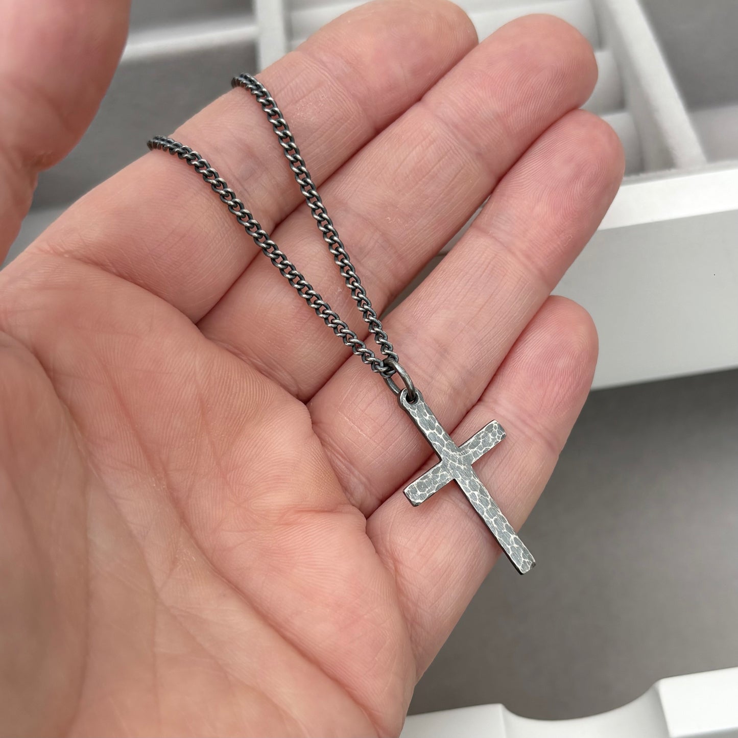 Oxidised or polished sterling silver standard size hammered cross pendant and on a curb chain