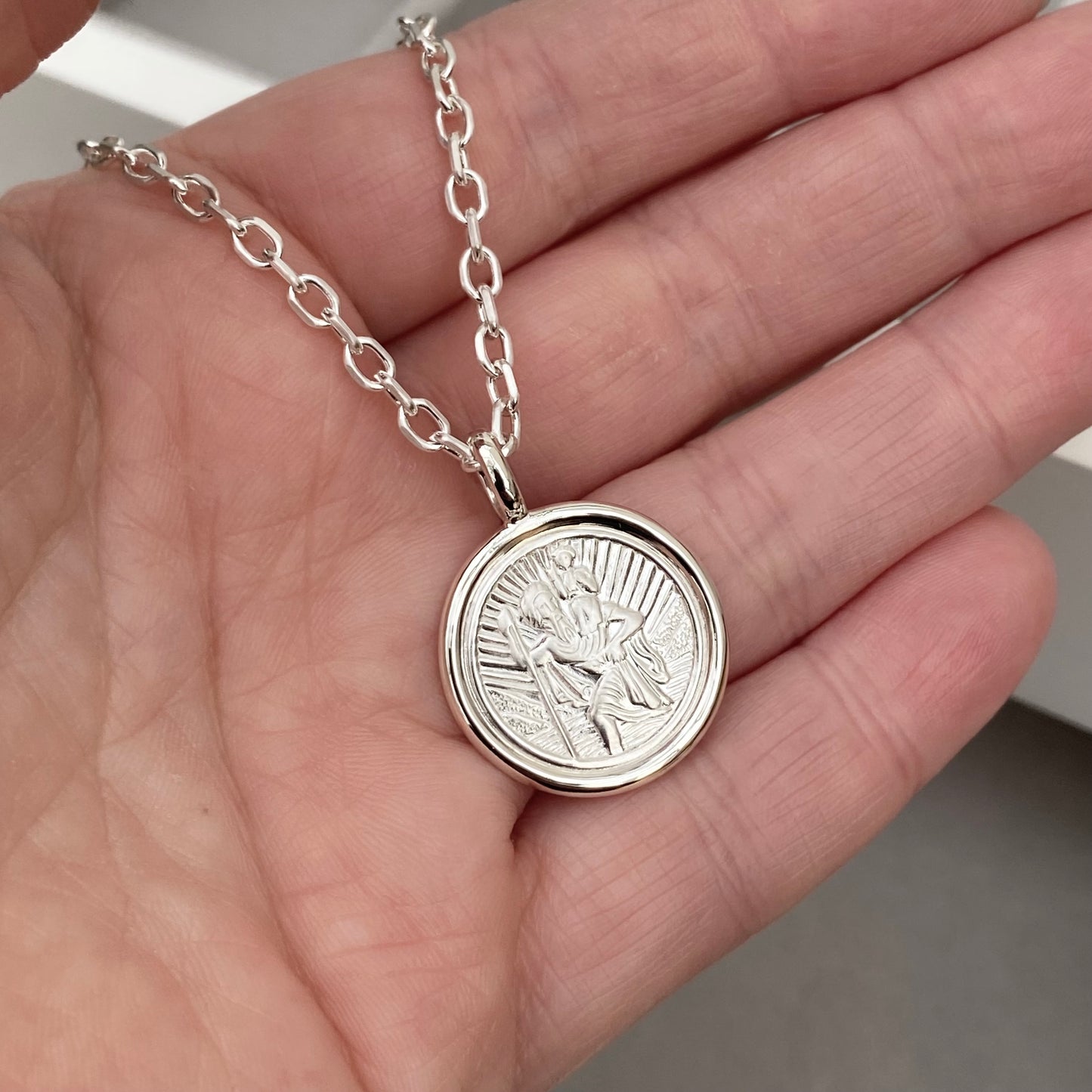 Oxidised solid silver Saint Christopher circle framed pendant on a 2.9mm wide diamond cut trace chain