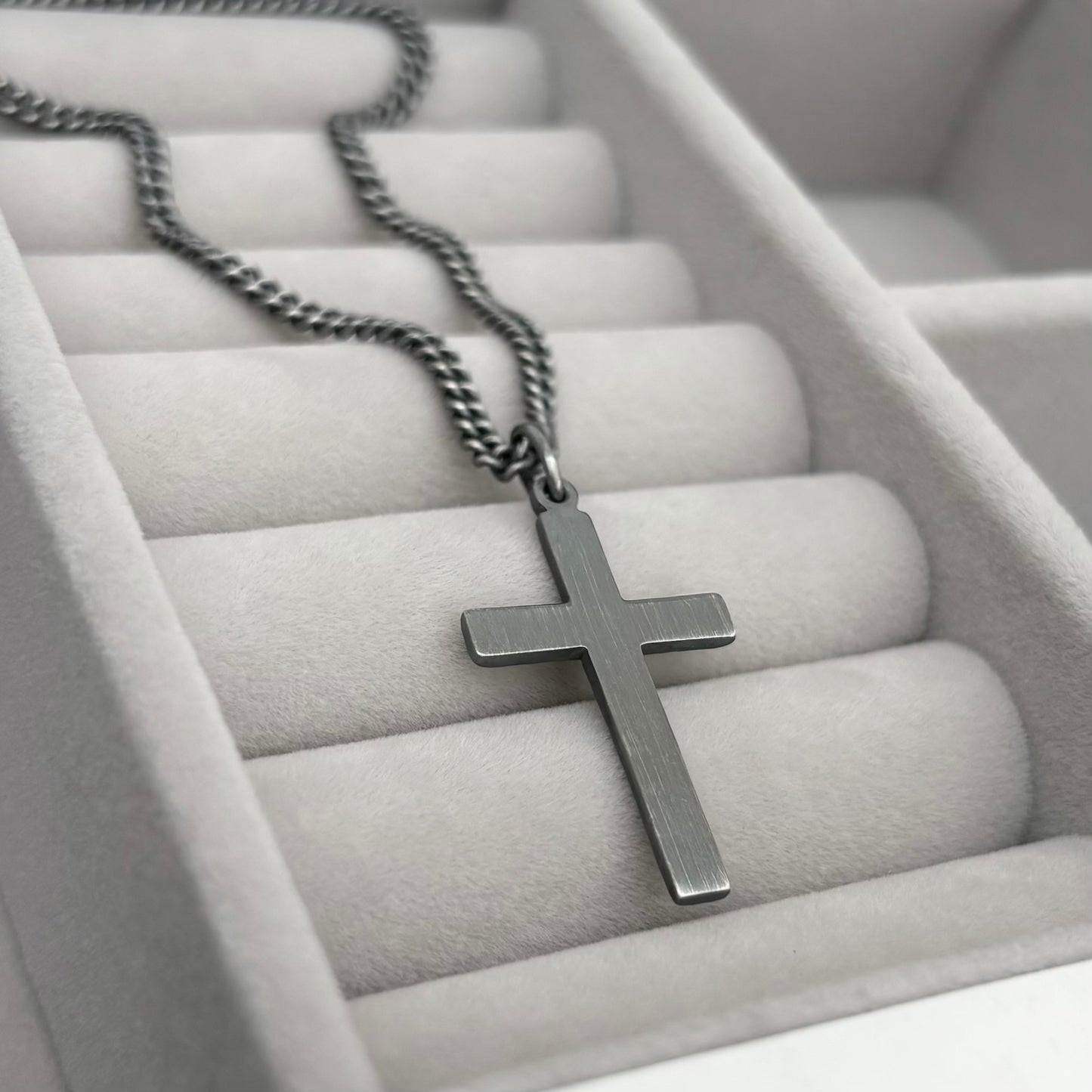 Oxidised or polished medium size sterling silver hammered cross pendant on a curb chain