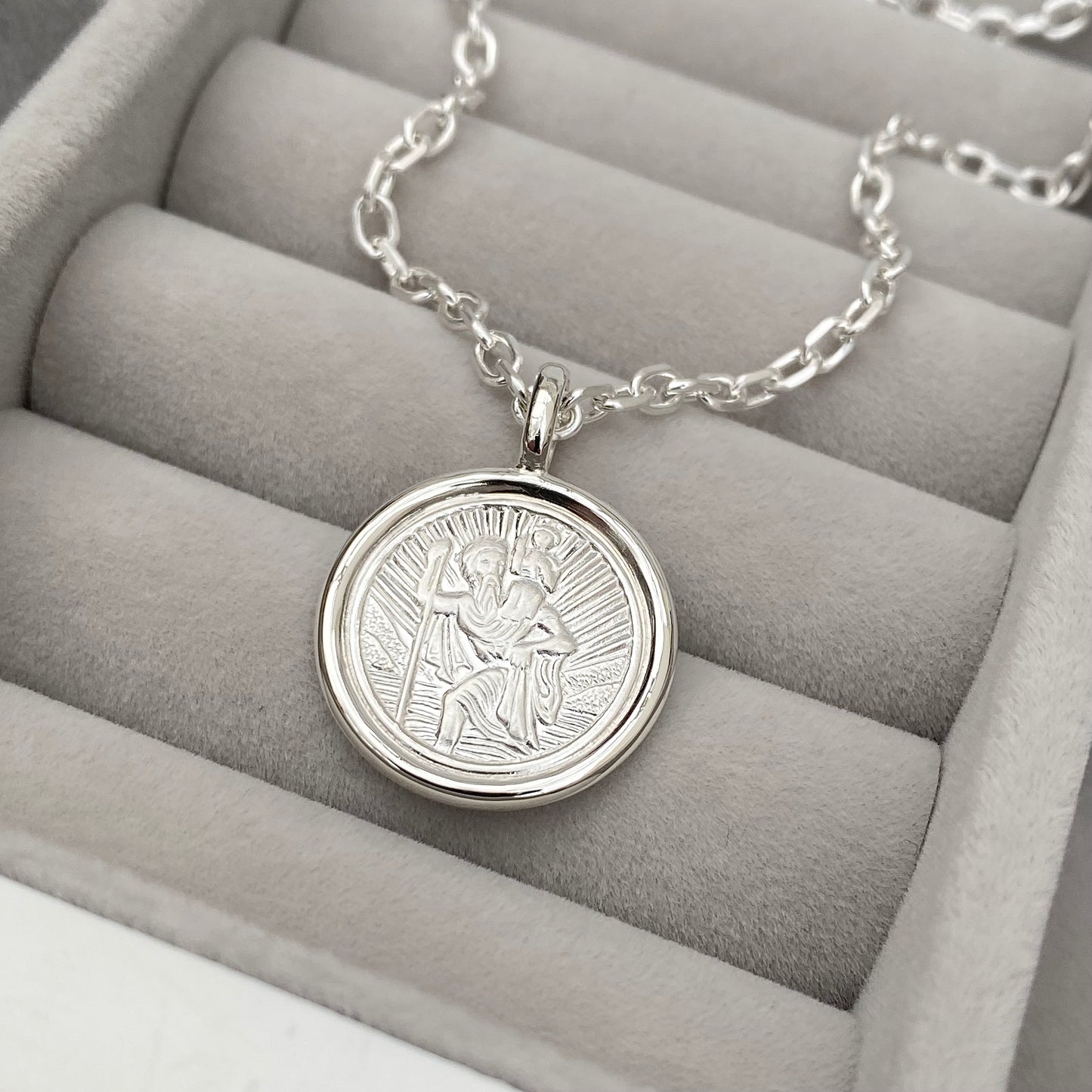 Oxidised solid silver Saint Christopher circle framed pendant on a 2.9mm wide diamond cut trace chain