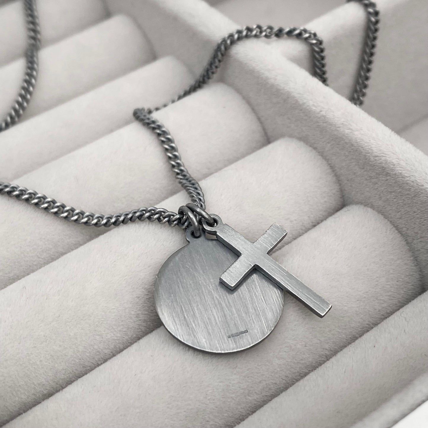 Oxidised or polished silver round Saint Christopher and hammered cross pendant and curb chain