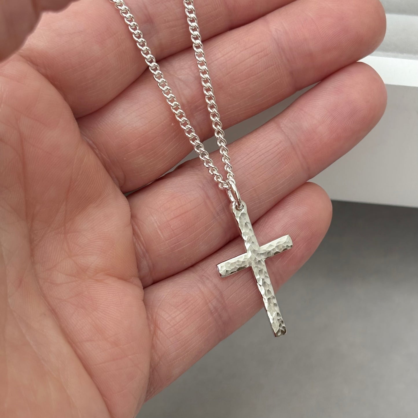 Oxidised or polished sterling silver standard size hammered cross pendant and on a curb chain