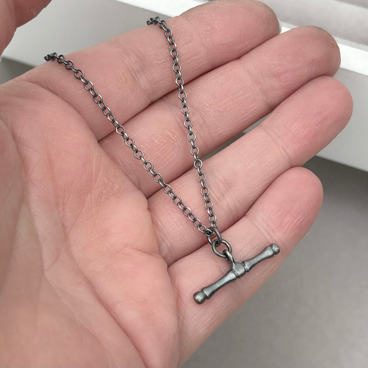 Oxidised or polished solid sterling silver T-bar pendant on a trace chain