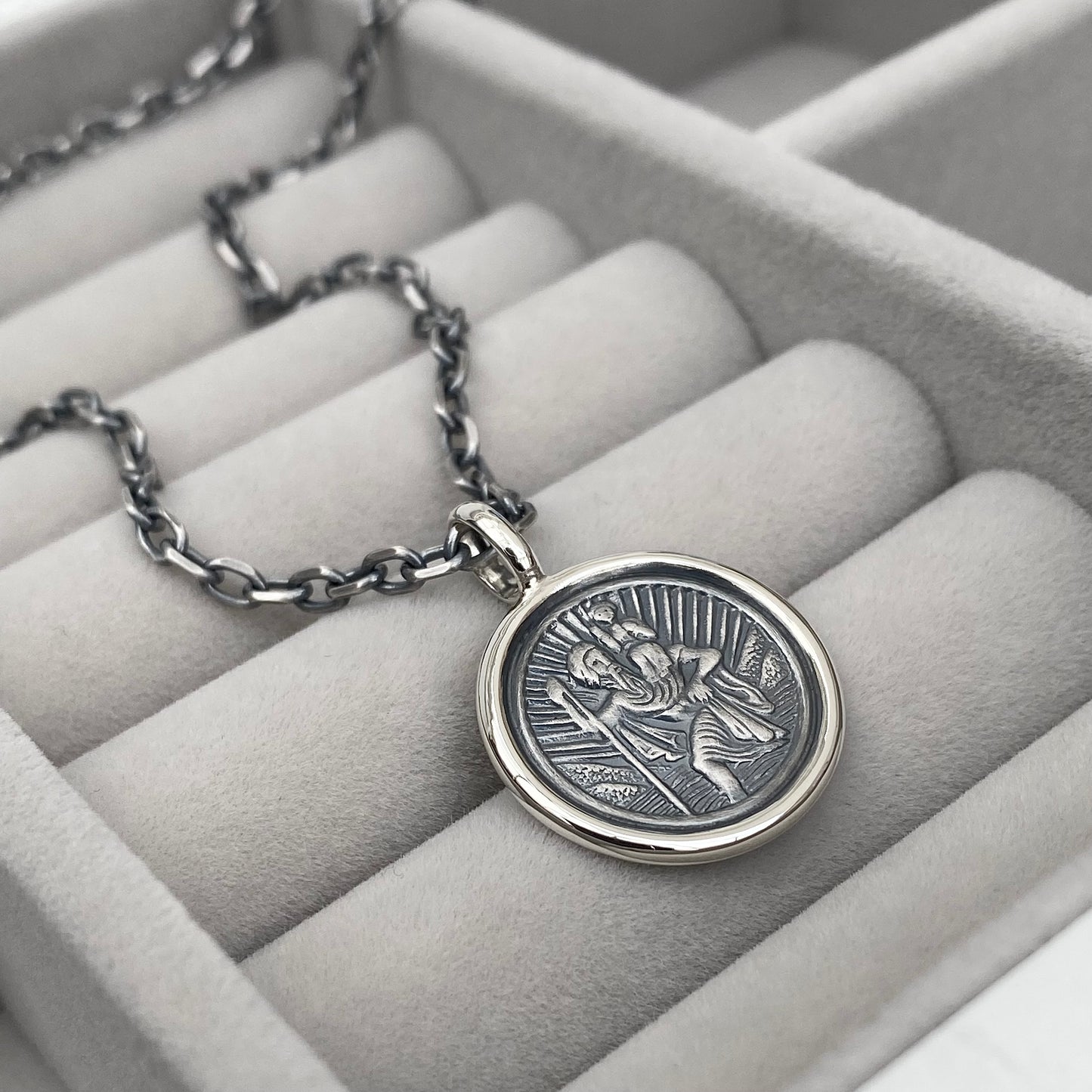 Oxidised solid silver Saint Christopher circle framed pendant on a 2.9mm wide diamond cut trace chain