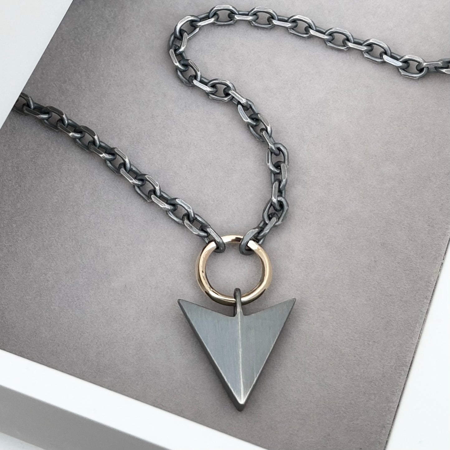 Oxidised or polished sterling silver large arrow and 9ct yellow gold loop pendant on a diamond cut trace chain