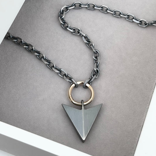 Oxidised or polished solid sterling silver large arrow and 9ct yellow gold loop pendant on a diamond cut trace chain