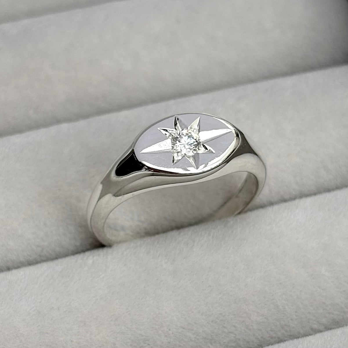 Hand engraved star set lab diamond sterling silver oval signet ring