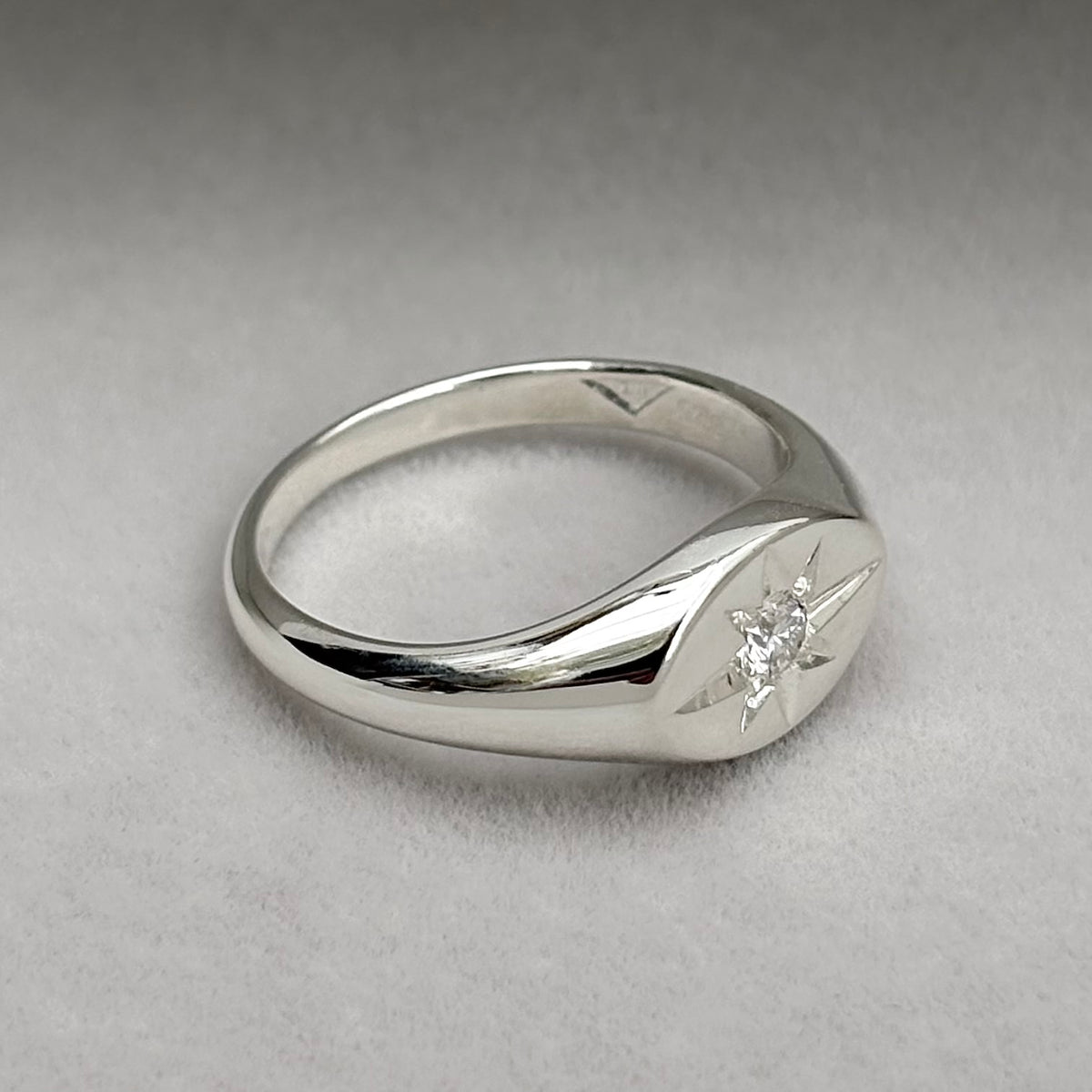 Hand engraved star set lab diamond sterling silver oval signet ring