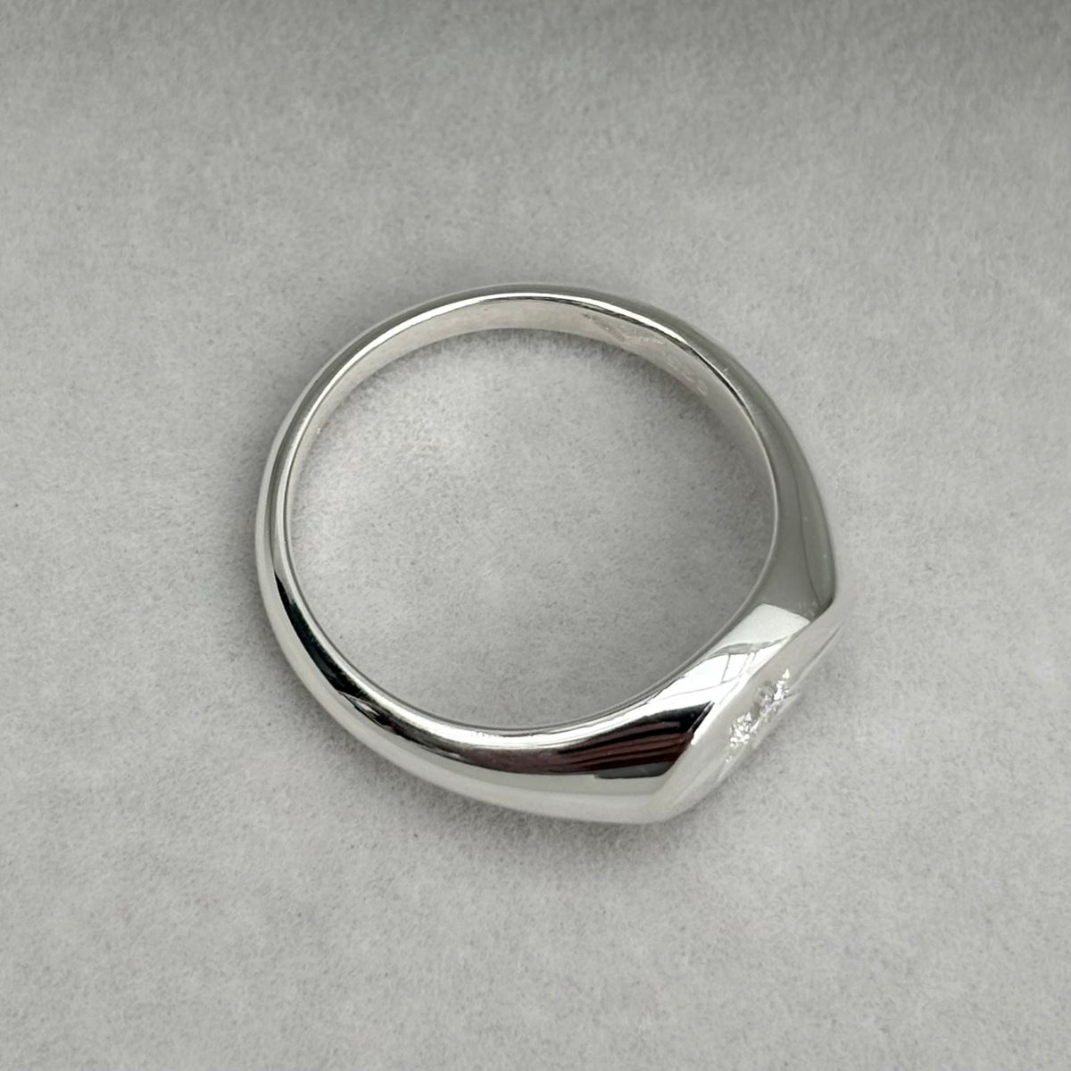 Hand engraved star set lab diamond sterling silver oval signet ring
