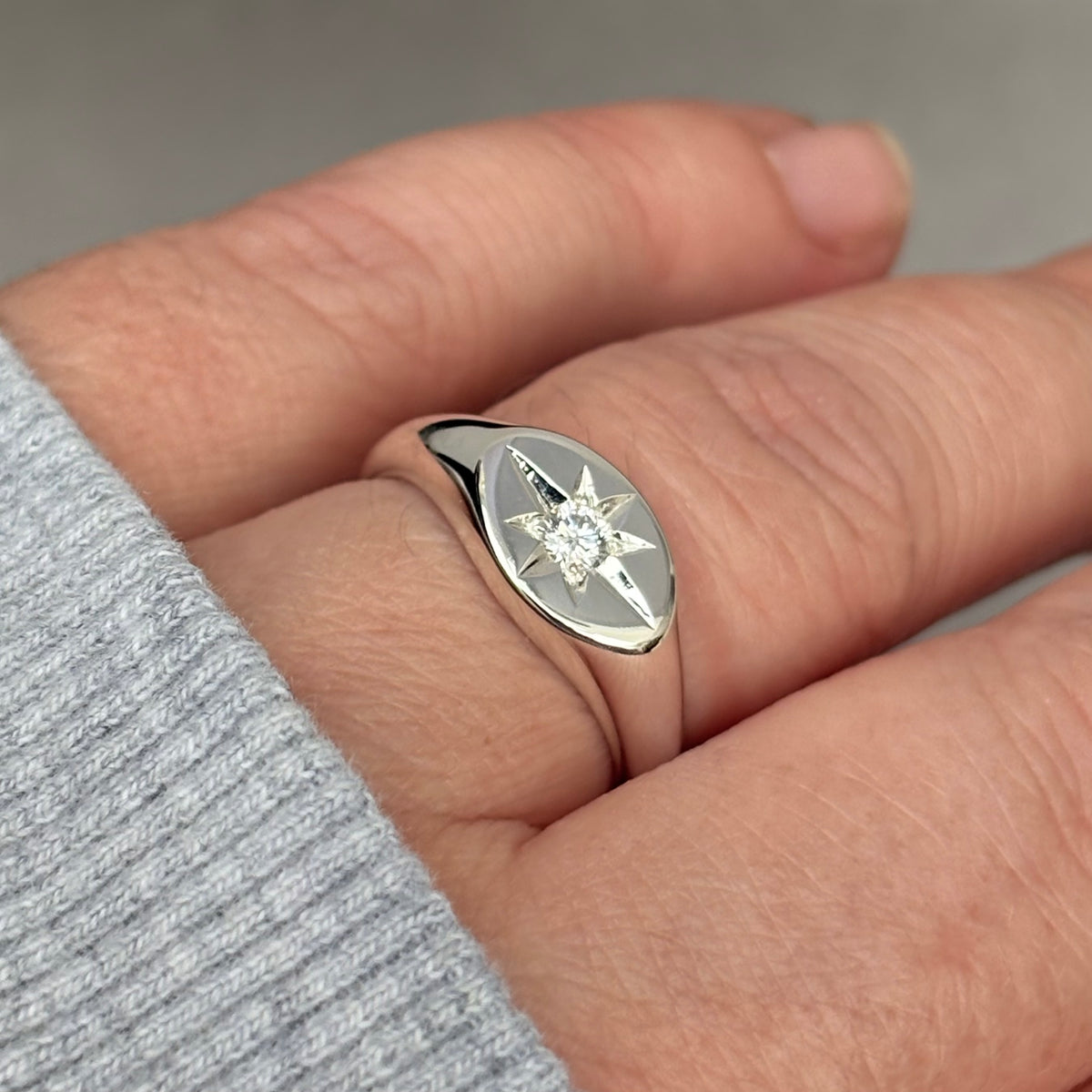 Hand engraved star set lab diamond sterling silver oval signet ring