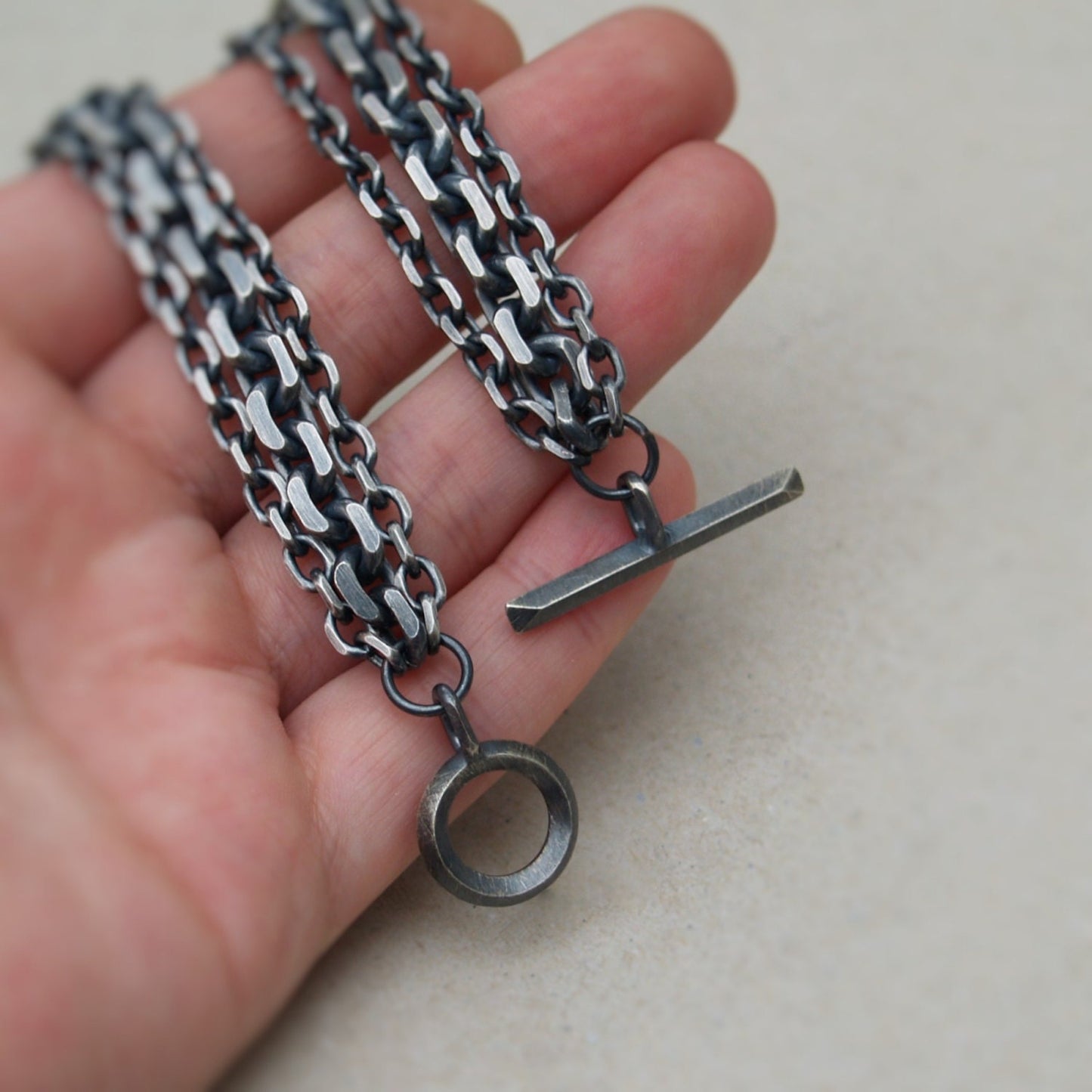 Oxidised or polished solid silver heavy triple diamond cut trace chain bracelet with a handmade unique T-bar design