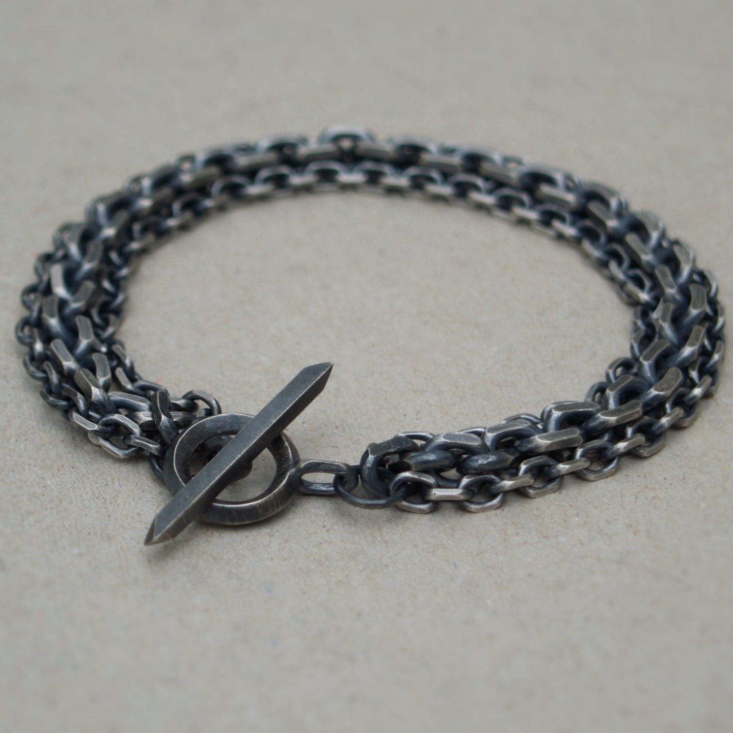 Oxidised or polished solid silver heavy triple diamond cut trace chain bracelet with a handmade unique T-bar design