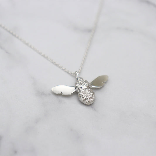 Solid silver garden bumblebee pendant on a trace chain