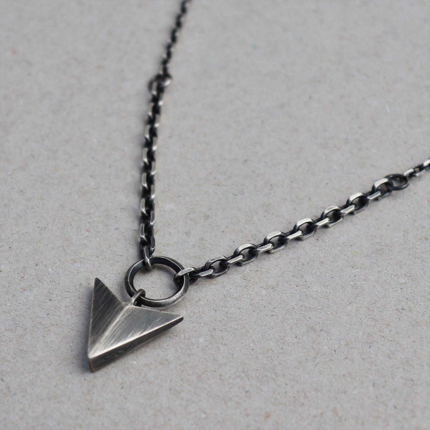 Oxidised solid silver large arrow pendant on two widths of diamond cut trace chain